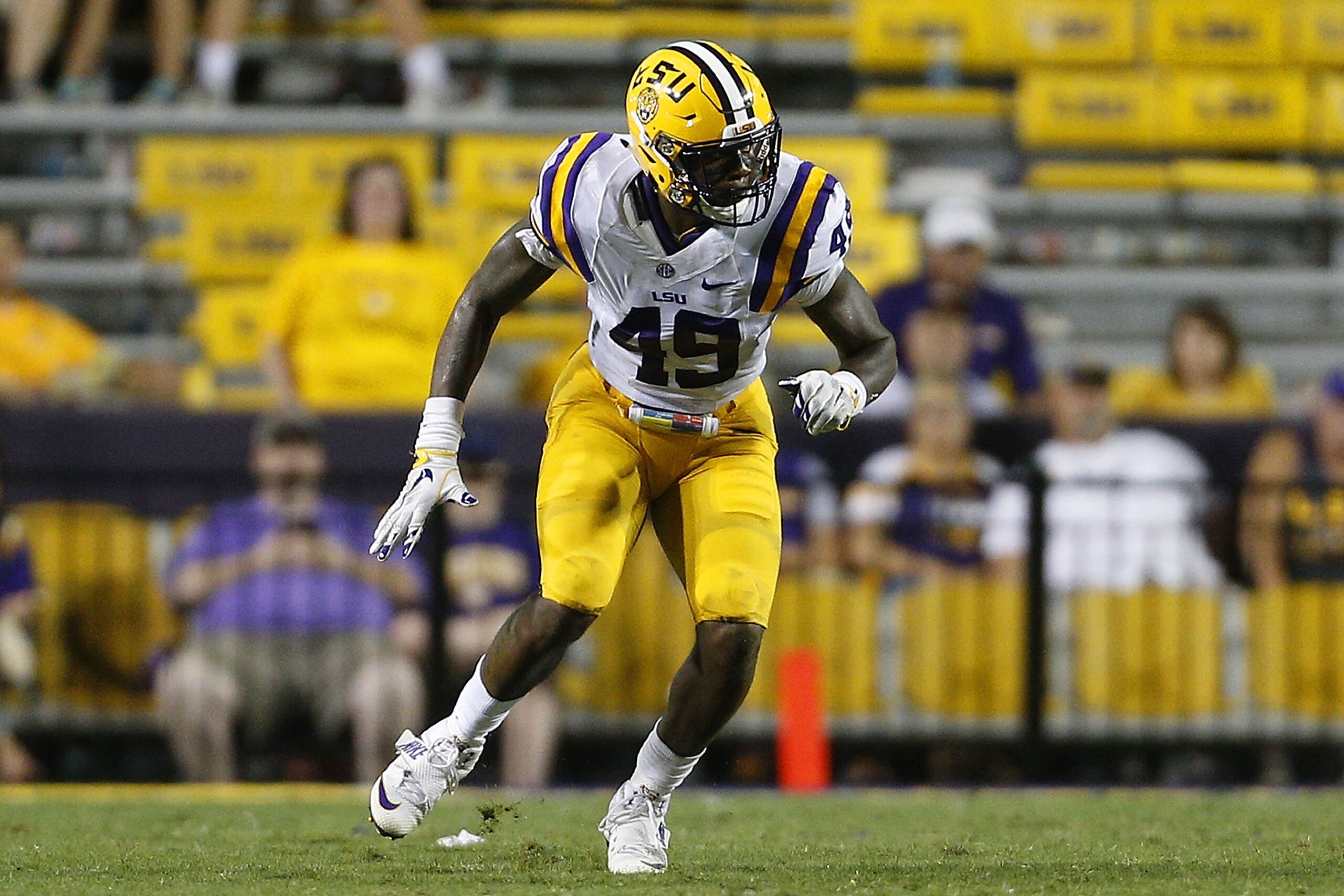 BATON ROUGE, LA - SEPTEMBER 10:  Arden Key #49 of the LSU Tigers defends during a game at Tiger Stadium on September 10, 2016 in Baton Rouge, Louisiana.  (Photo by Jonathan Bachman/Getty Images)