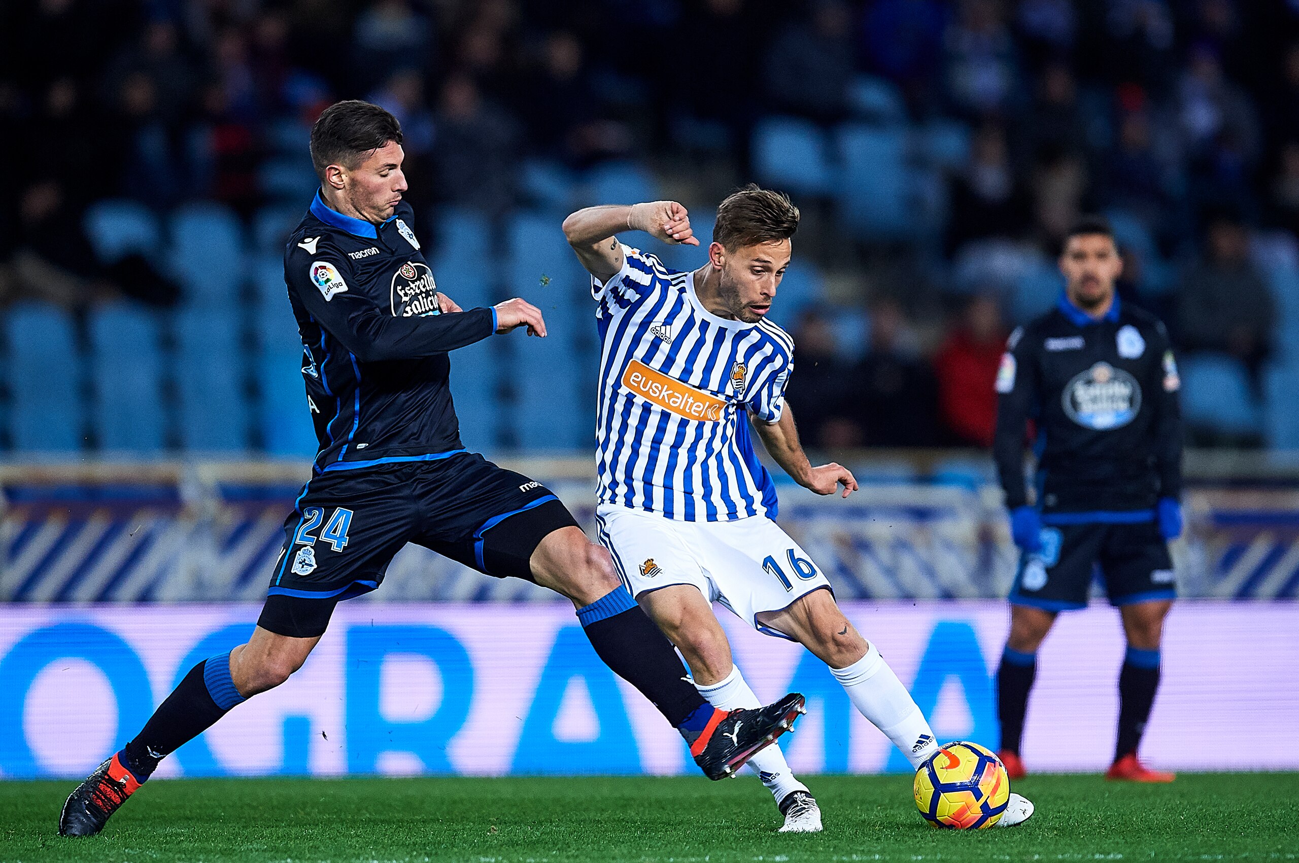 SAN SEBASTIAN, SPAIN - FEBRUARY 02: Fabian Schar of RC Deportivo La Coruna duels for the ball with Sergio Canales of Real Sociedad during the La Liga match between Real Sociedad de Futbol and RC Deportivo La Coruna at Estadio Anoeta on February 2, 2018 i SAN SEBASTIAN, SPAIN - FEBRUARY 02: Fabian Schar of RC Deportivo La Coruna duels for the ball with Sergio Canales of Real Sociedad during the La Liga match between Real Sociedad de Futbol and RC Deportivo La Coruna at Estadio Anoeta on February 2, 2018 i