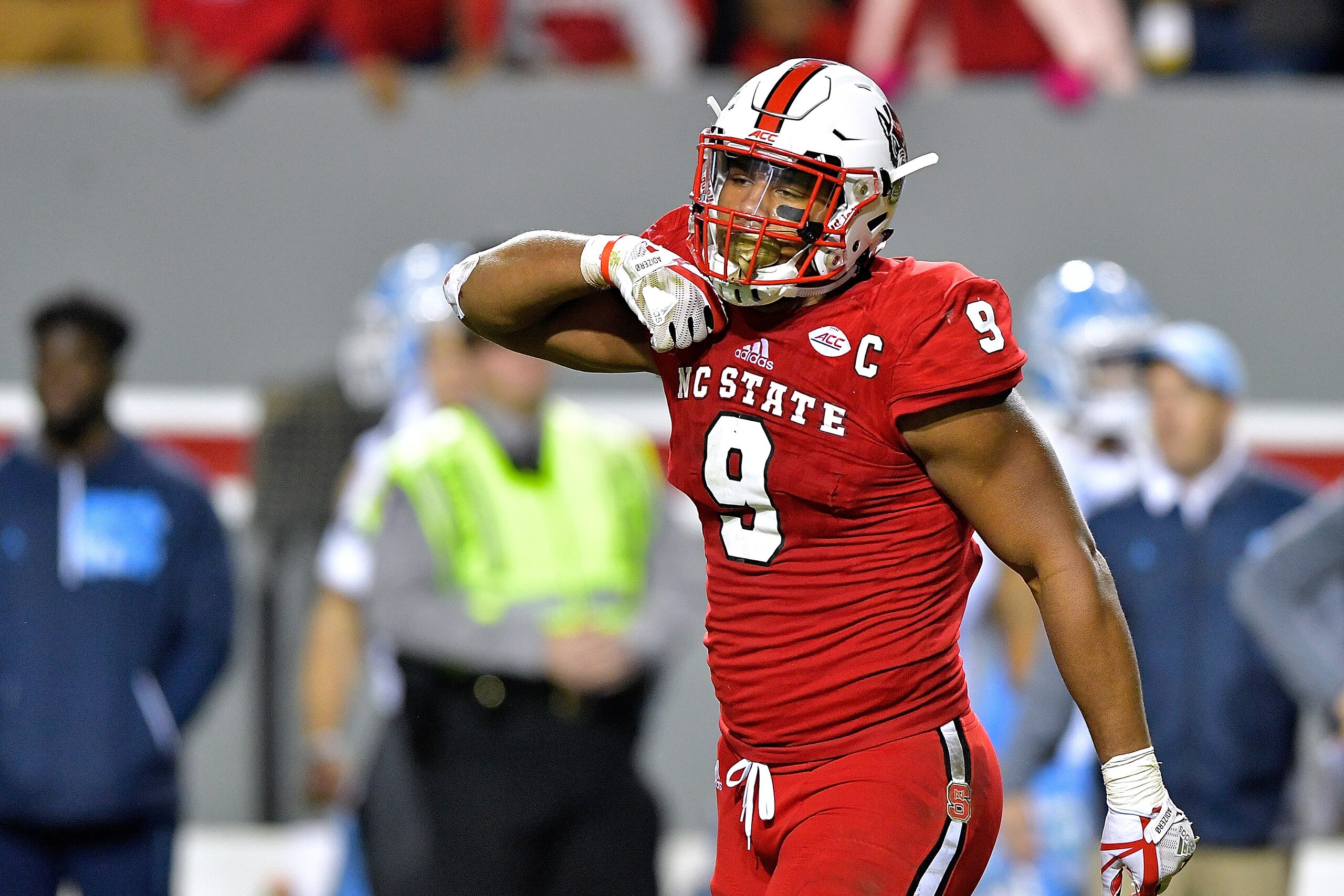 RALEIGH, NC - NOVEMBER 25:  Bradley Chubb #9 of the North Carolina State Wolfpack reacts after a win against the North Carolina Tar Heels during their game at Carter Finley Stadium on November 25, 2017 in Raleigh, North Carolina. North Carolina State won 