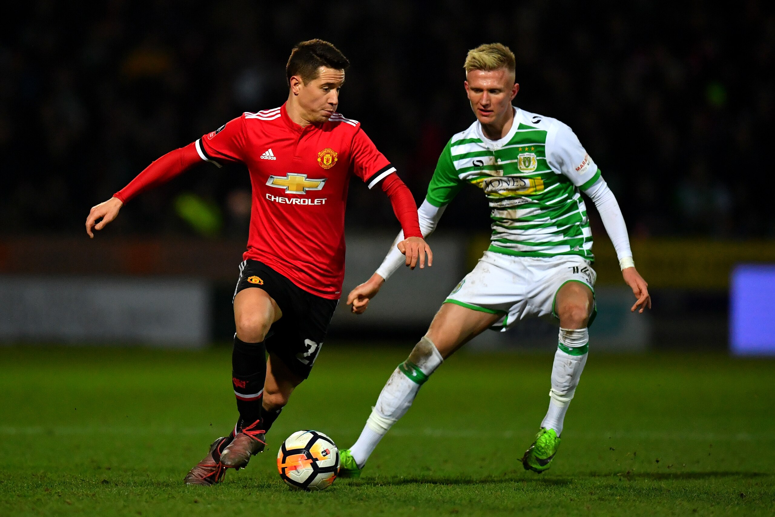 YEOVIL, ENGLAND - JANUARY 26:  Ander Herrera of Manchester United and Sam Surridge of Yeovil Town during The Emirates FA Cup Fourth Round match between Yeovil Town and Manchester United at Huish Park on January 26, 2018 in Yeovil, England.  (Photo by Dan 