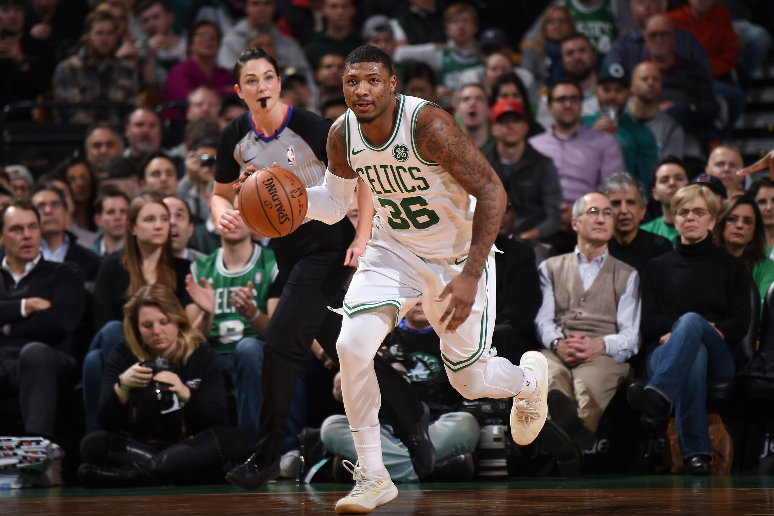BOSTON, MA - JANUARY 16:  Marcus Smart #36 of the Boston Celtics brings the ball up court against the New Orleans Pelicans on January 16, 2018 at the TD Garden in Boston, Massachusetts.  NOTE TO USER: User expressly acknowledges and agrees that, by downlo