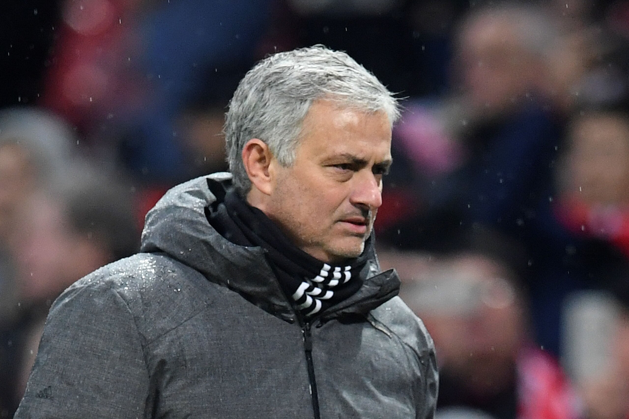 Manchester United's Portuguese manager Jose Mourinho leaves the pitch at the end of the English Premier League football match between Manchester United and Huddersfield Town at Old Trafford in Manchester, north west England, on February 3, 2018. / AFP PHO