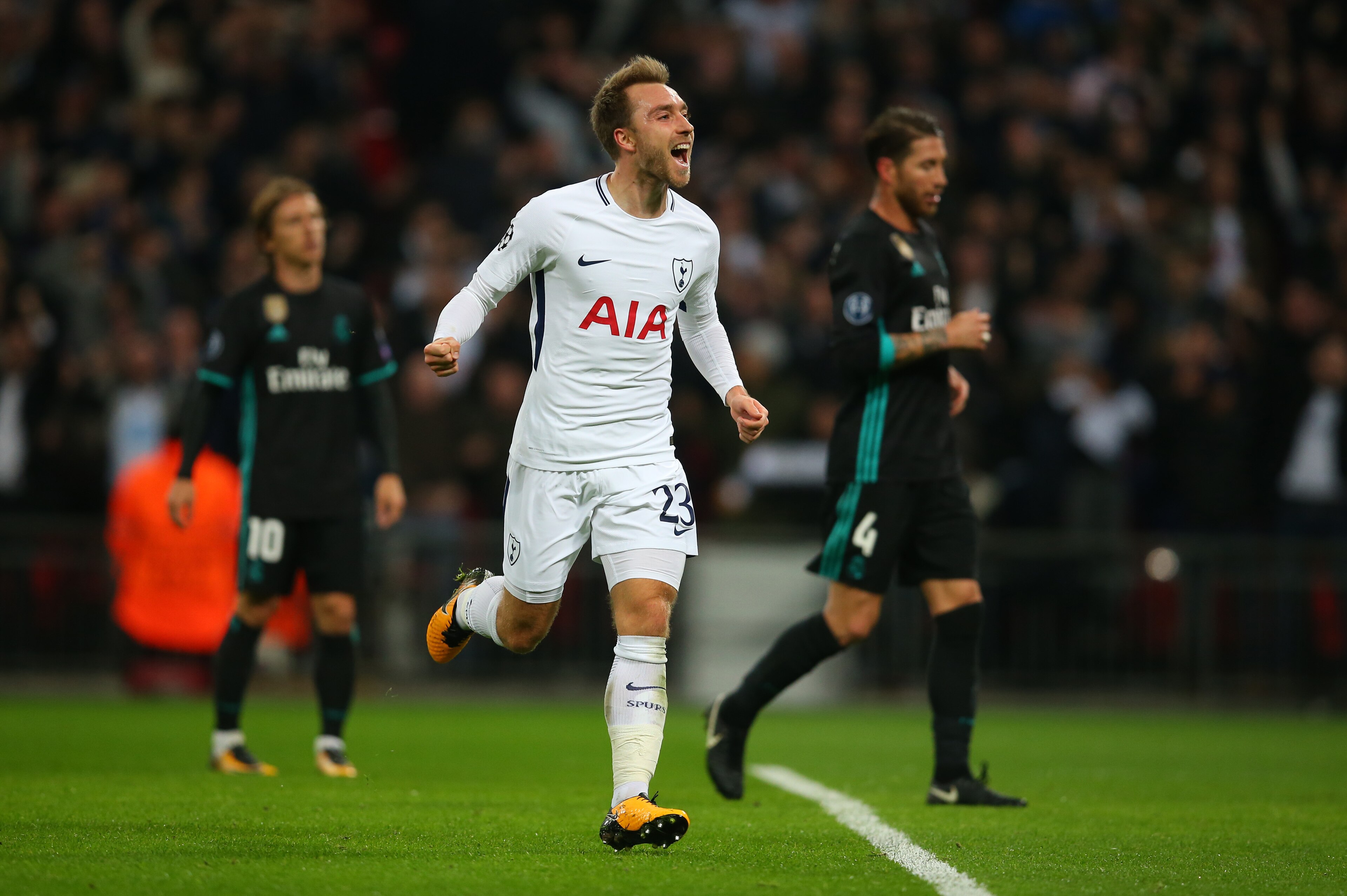 LONDON, ENGLAND - NOVEMBER 01: Christian Eriksen of Tottenham Hotspur celebrates after he scores a goal to make it 3-0 during the UEFA Champions League group H match between Tottenham Hotspur and Real Madrid at Wembley Stadium on November 1, 2017 in Londo