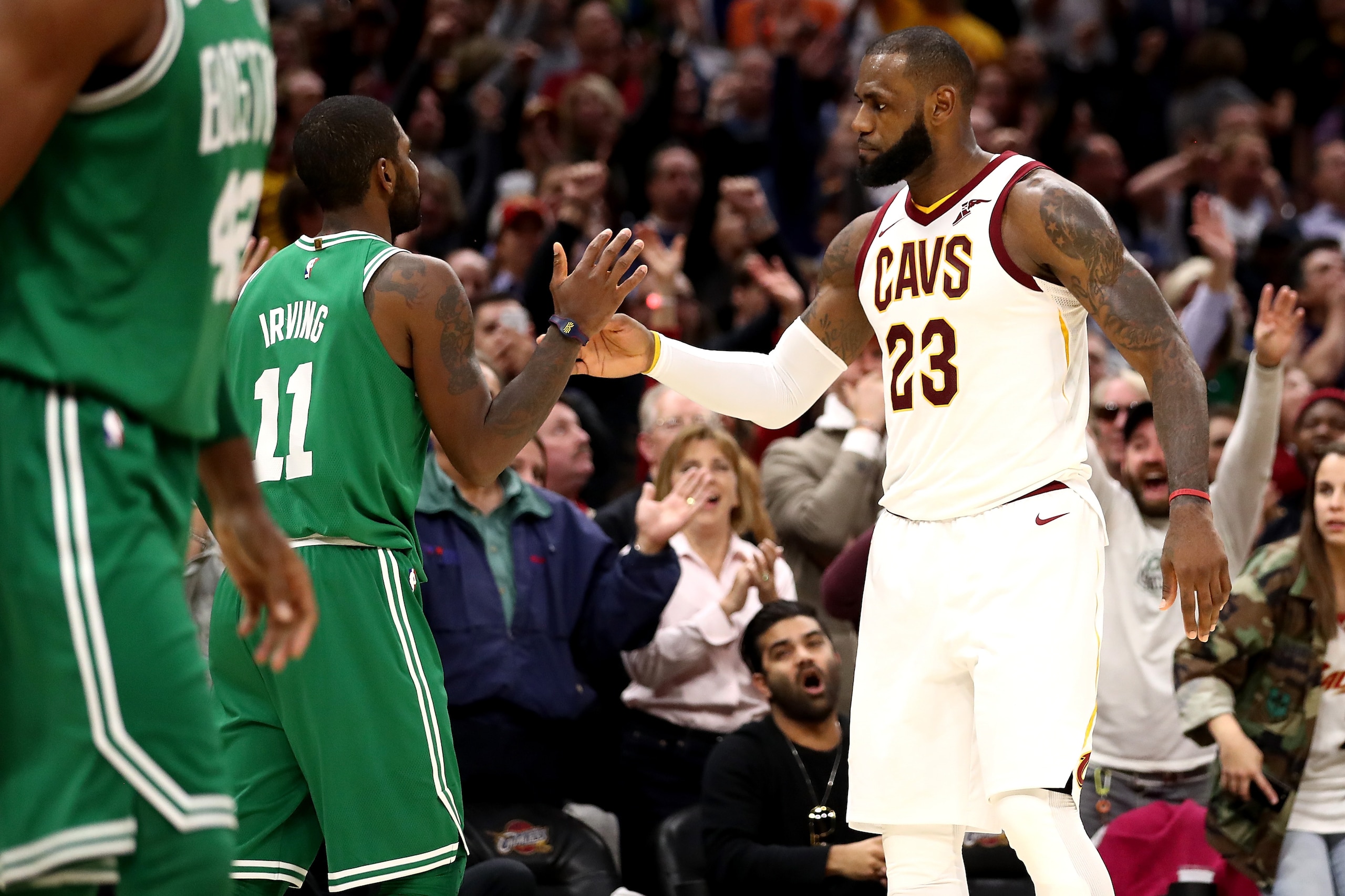 CLEVELAND, OH - OCTOBER 17: LeBron James #23 of the Cleveland Cavaliers and Kyrie Irving #11 of the Boston Celtics shake hands after a Cavaliers 102-99 victory at Quicken Loans Arena on October 17, 2017 in Cleveland, Ohio. NOTE TO USER: User expressly ac CLEVELAND, OH - OCTOBER 17: LeBron James #23 of the Cleveland Cavaliers and Kyrie Irving #11 of the Boston Celtics shake hands after a Cavaliers 102-99 victory at Quicken Loans Arena on October 17, 2017 in Cleveland, Ohio. NOTE TO USER: User expressly ac