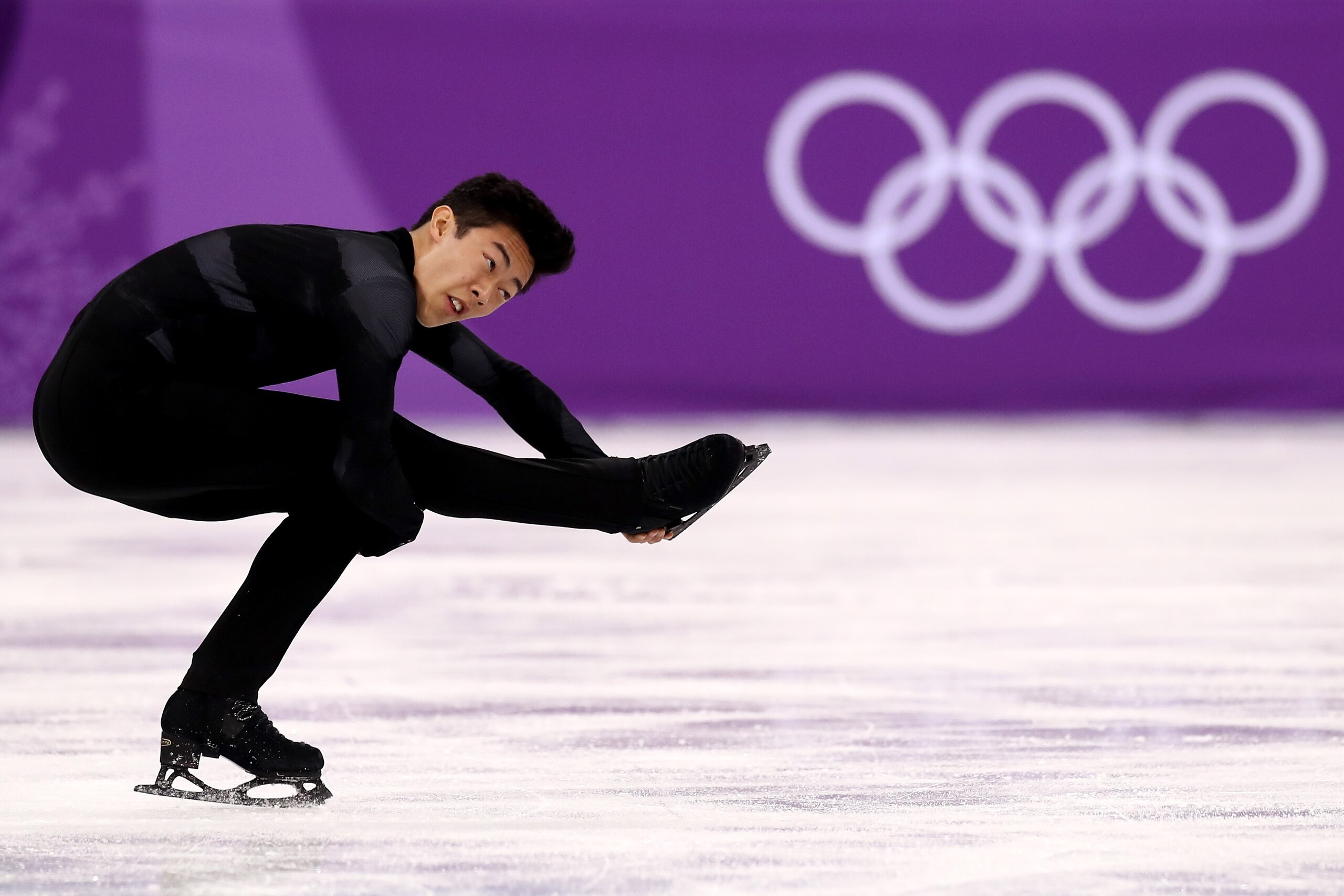GANGNEUNG, SOUTH KOREA - FEBRUARY 09:  Nathan Chen of the United States competes in the Figure Skating Team Event - Men's Single Skating Short Program during the PyeongChang 2018 Winter Olympic Games at Gangneung Ice Arena on February 9, 2018 in Gangneung