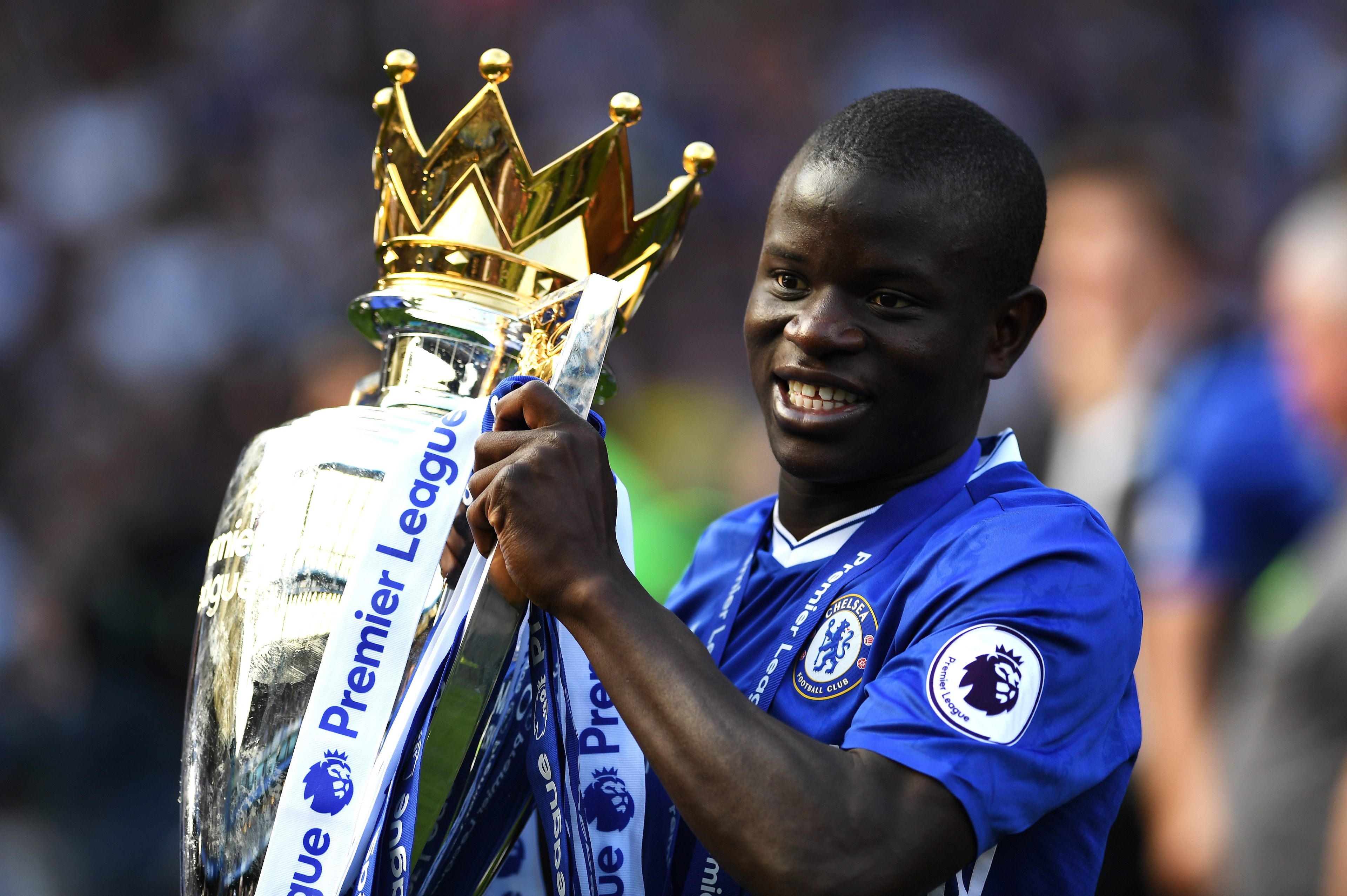 LONDON, ENGLAND - MAY 21: N'Golo Kante of Chelsea celebrates with the Premier League Trophy after the Premier League match between Chelsea and Sunderland at Stamford Bridge on May 21, 2017 in London, England.  (Photo by Shaun Botterill/Getty Images)