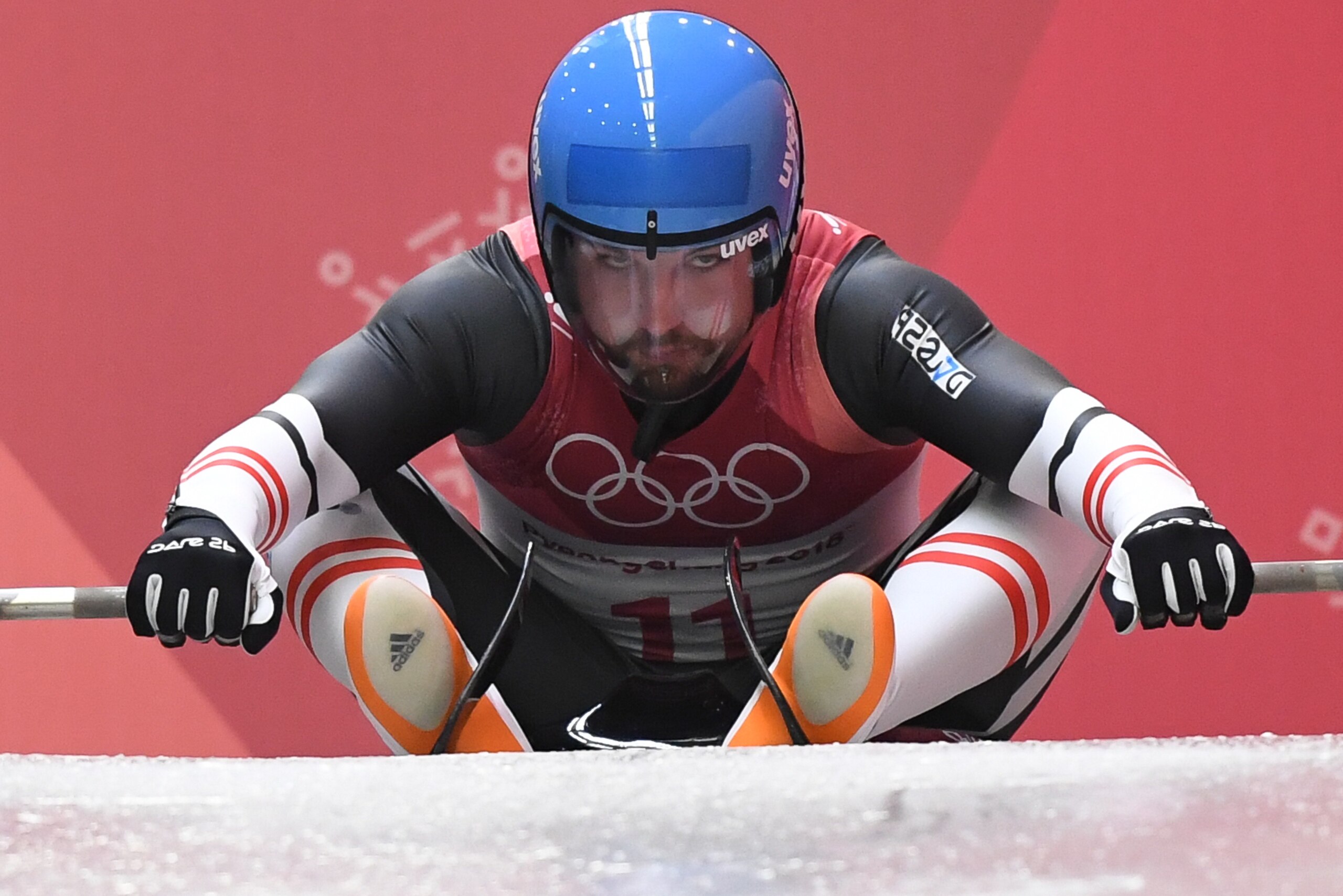 Austria's David Gleirscher competes in the men's luge singles run 1 during the Pyeongchang 2018 Winter Olympic Games, at the Olympic Sliding Centre on February 10, 2018 in Pyeongchang. / AFP PHOTO / Mark Ralston (Photo credit should read MARK RALS Austria's David Gleirscher competes in the men's luge singles run 1 during the Pyeongchang 2018 Winter Olympic Games, at the Olympic Sliding Centre on February 10, 2018 in Pyeongchang. / AFP PHOTO / Mark Ralston (Photo credit should read MARK RALS