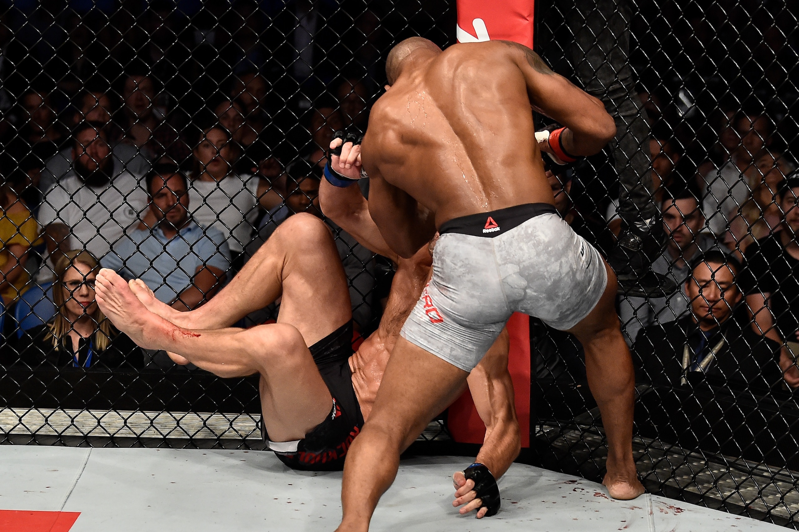 PERTH, AUSTRALIA - FEBRUARY 11:  (R-L) Yoel Romero of Cuba punches Luke Rockhold in their interim middleweight title bout during the UFC 221 event at Perth Arena on February 11, 2018 in Perth, Australia. (Photo by Jeff Bottari/Zuffa LLC/Zuffa LLC via Gett