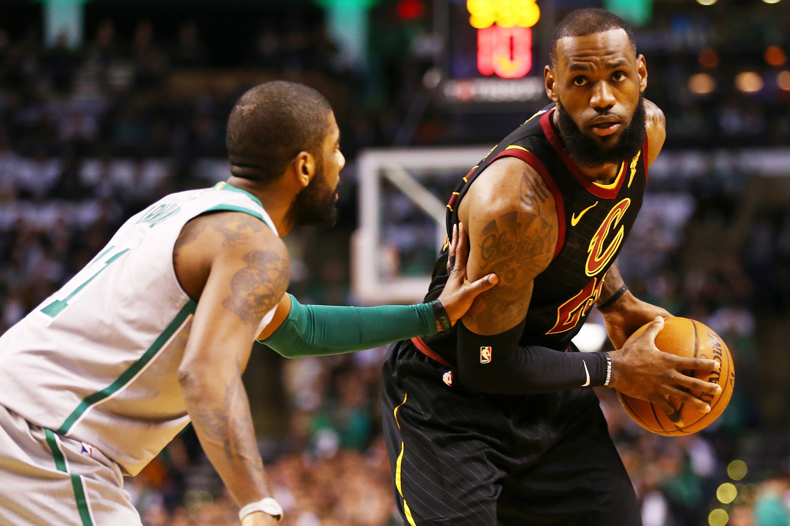 BOSTON, MA - FEBRUARY 11:  Lebron James #23 of the Cleveland Cavaliers is guarded by Kyrie Irving #11 of the Boston Celtics during the first quarter of a game at TD Garden on February 11, 2018 in Boston, Massachusetts. NOTE TO USER: User expressly acknowl