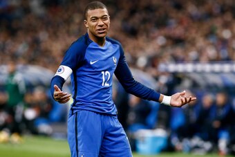 PARIS, FRANCE - NOVEMBER 10: Kylian Mbappe #12 of France reacts to a play during the international friendly match between France and Wales at Stade de France on November 10, 2017 in Paris, France. (Photo by Catherine Steenkeste/Getty Images)