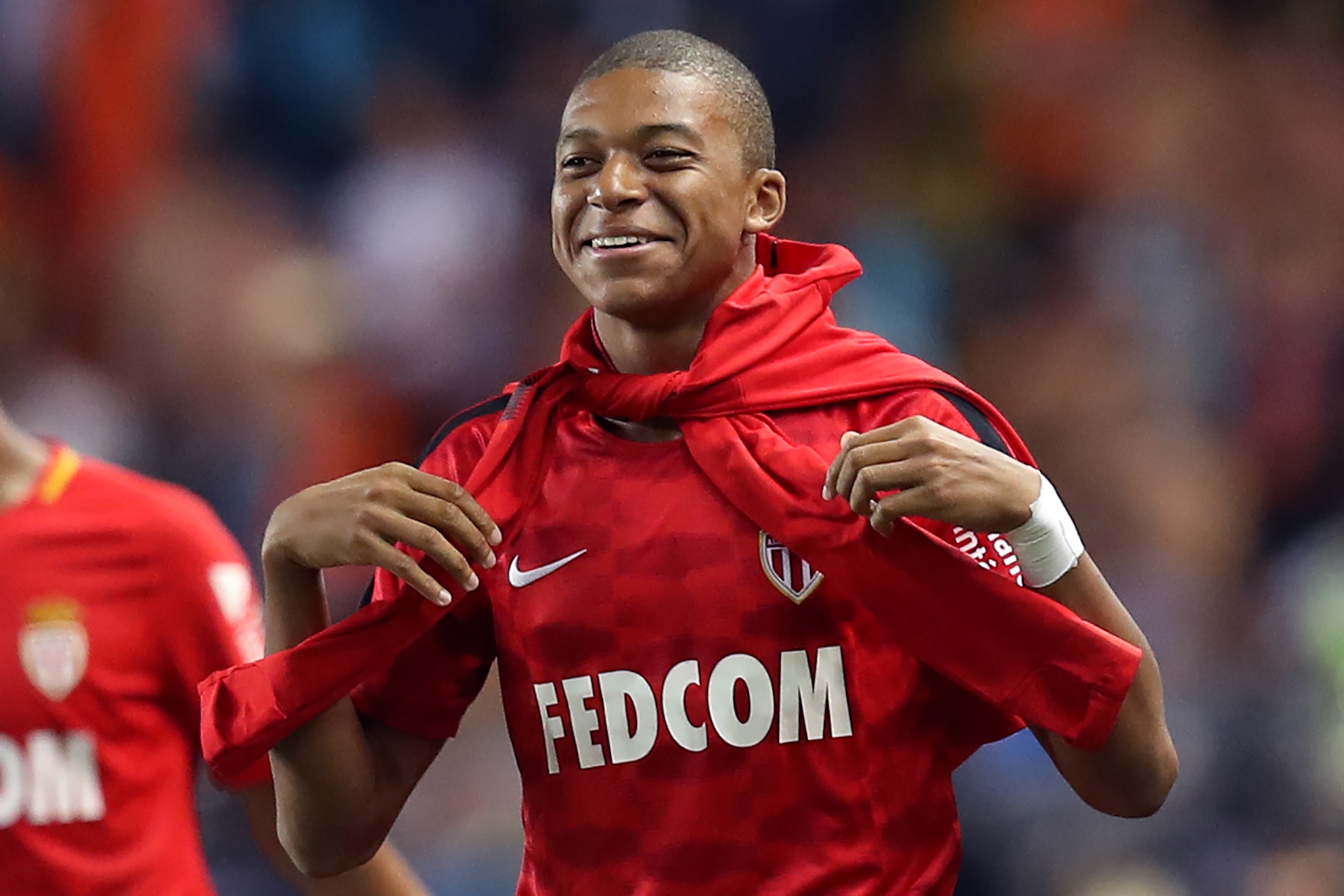 Monaco's French forward Kylian Mbappe smiles after the French L1 football match between Monaco (ASM) and Marseille (OM) on August 27, 2017, at the Louis II Stadium in Monaco. / AFP PHOTO / VALERY HACHE (Photo credit should read VALERY HACHE/AFP/Get Monaco's French forward Kylian Mbappe smiles after the French L1 football match between Monaco (ASM) and Marseille (OM) on August 27, 2017, at the Louis II Stadium in Monaco. / AFP PHOTO / VALERY HACHE (Photo credit should read VALERY HACHE/AFP/Get