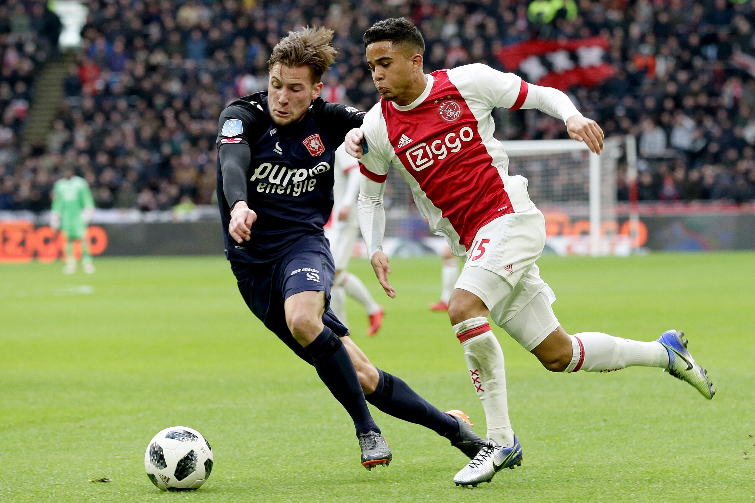 AMSTERDAM, NETHERLANDS - FEBRUARY 11: (L-R) Hidde Ter Avest of FC Twente, Justin Kluivert of Ajax  during the Dutch Eredivisie  match between Ajax v Fc Twente at the Johan Cruijff Arena on February 11, 2018 in Amsterdam Netherlands (Photo by Eric Verhoeve