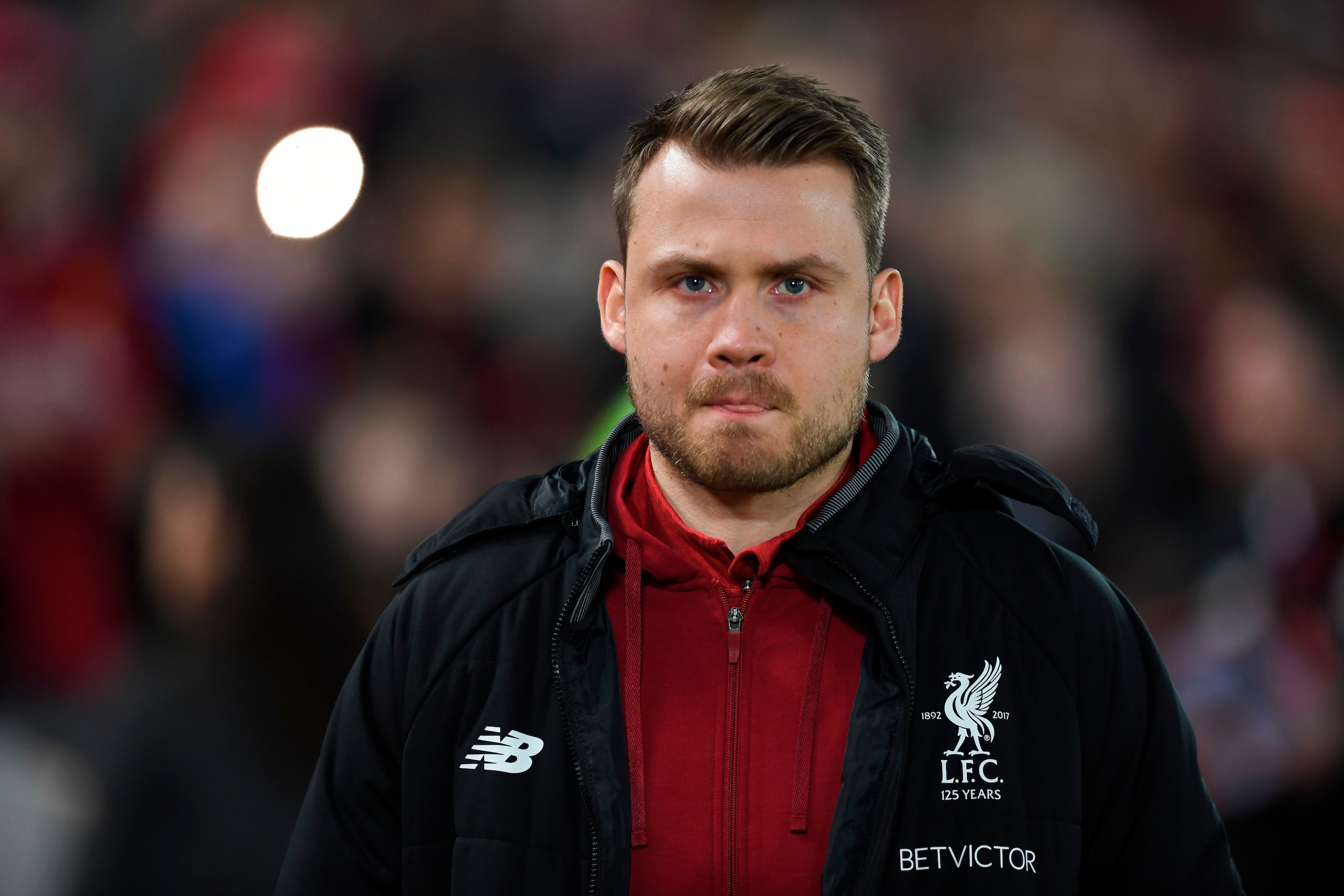 Liverpool's Belgian goalkeeper Simon Mignolet heads for the stands to watch the English FA Cup third round football match between Liverpool and Everton at Anfield in Liverpool, north west England on January 5, 2018. / AFP PHOTO / Paul ELLIS / RESTRICTED T
