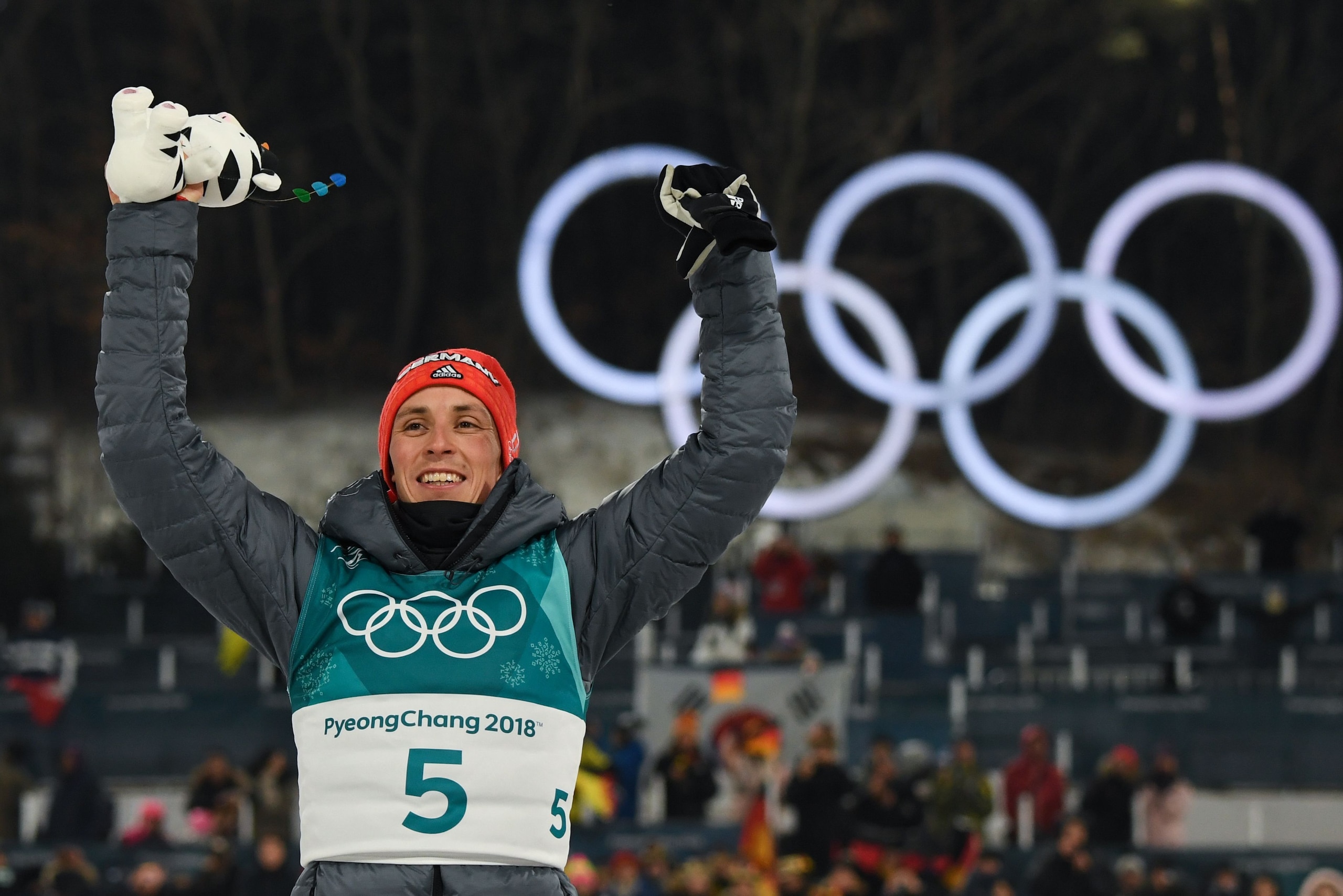 Gold medallist Germany's Eric Frenzel reacts on the podium following the nordic combined men's individual normal hill NH/10km final at the Alpensia cross country centre during the Pyeongchang 2018 Winter Olympic Games on February 14 , 2018 in Pyeongchang. Gold medallist Germany's Eric Frenzel reacts on the podium following the nordic combined men's individual normal hill NH/10km final at the Alpensia cross country centre during the Pyeongchang 2018 Winter Olympic Games on February 14 , 2018 in Pyeongchang.