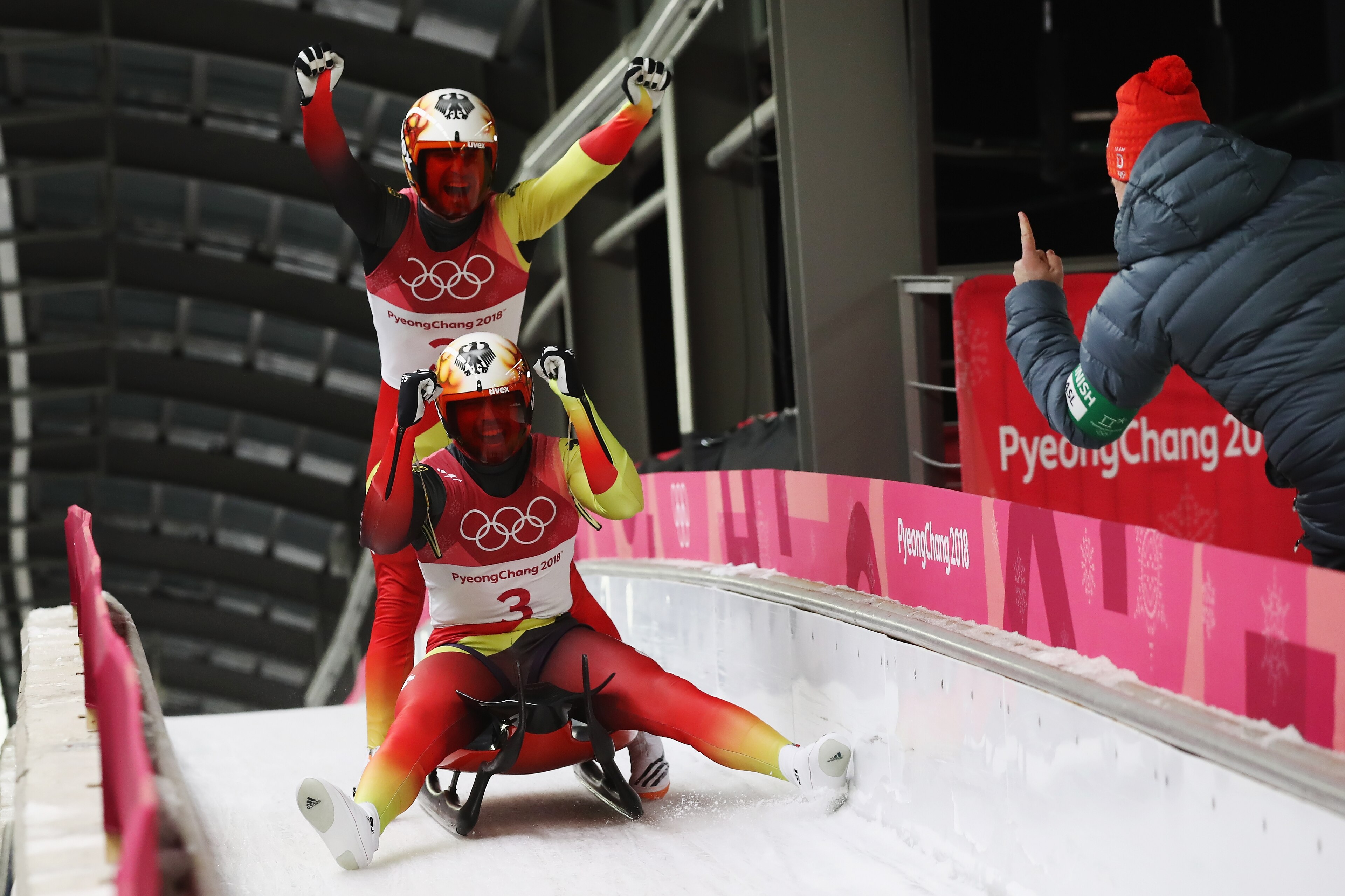 PYEONGCHANG-GUN, SOUTH KOREA - FEBRUARY 14:  Tobias Wendl and Tobias Arlt of Germany celebrate at the finish as they win gold during the Luge Doubles on day five of the PyeongChang 2018 Winter Olympics at the Olympic Sliding Centre on February 14, 2018 in
