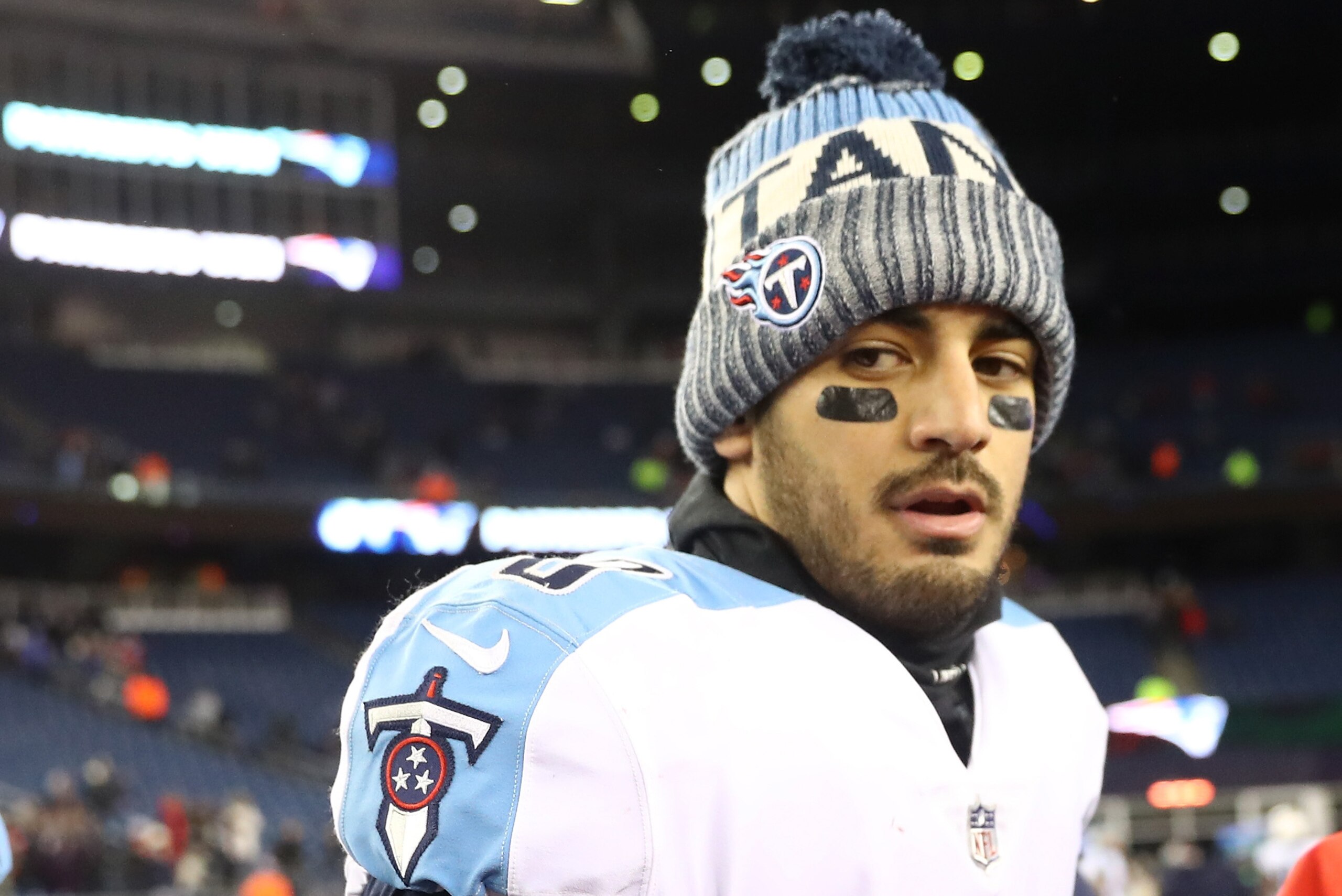 FOXBOROUGH, MA - JANUARY 13:  Marcus Mariota #8 of the Tennessee Titans reacts after the AFC Divisional Playoff game against the New England Patriots at Gillette Stadium on January 13, 2018 in Foxborough, Massachusetts.  (Photo by Elsa/Getty Images)