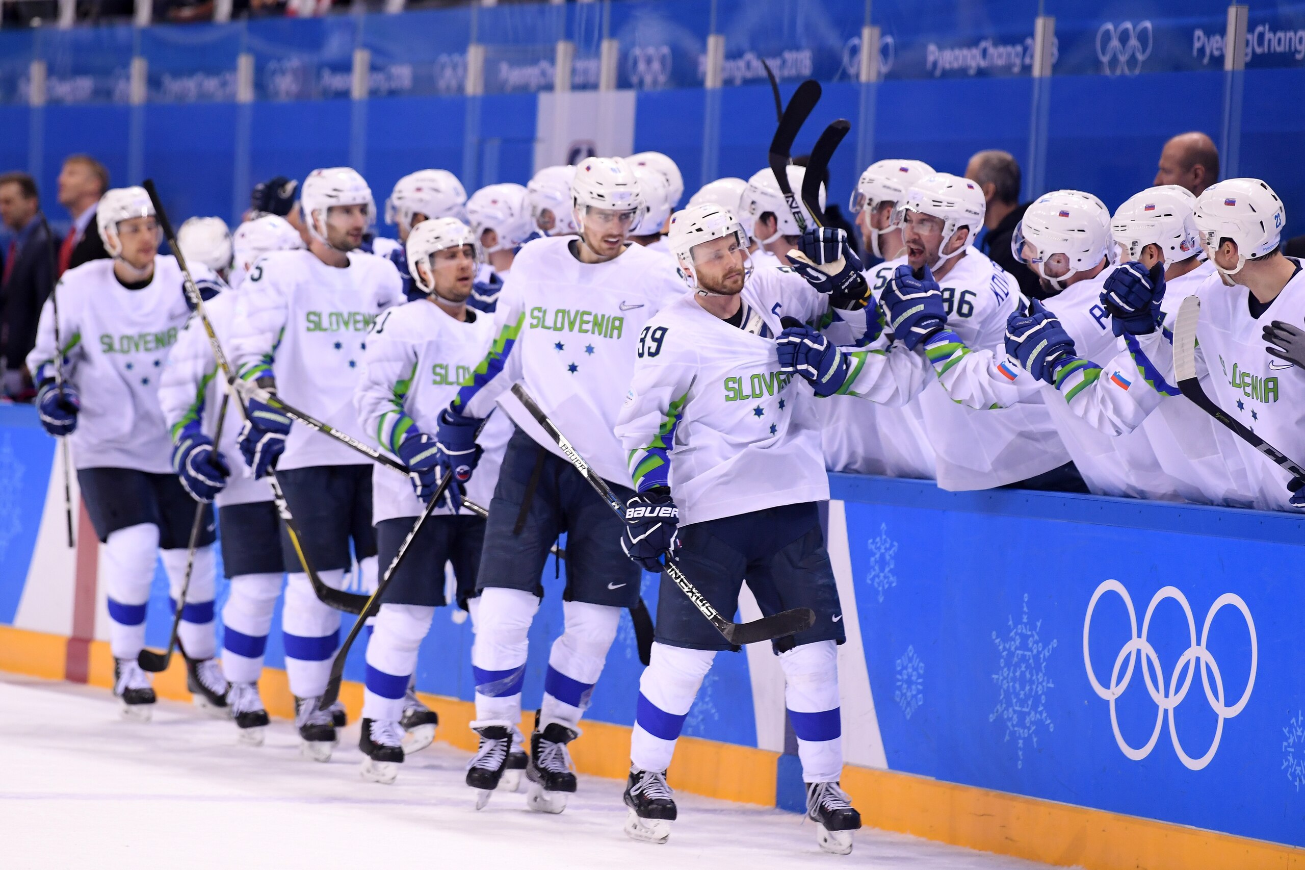 GANGNEUNG, SOUTH KOREA - FEBRUARY 14:  Jan Mursak #39 of Slovenia celebrates after scoring the tying goal against Ryan Zapolski #30 of the United States in the third period during the Men's Ice Hockey Preliminary Round Group B game on day five of the Pyeo