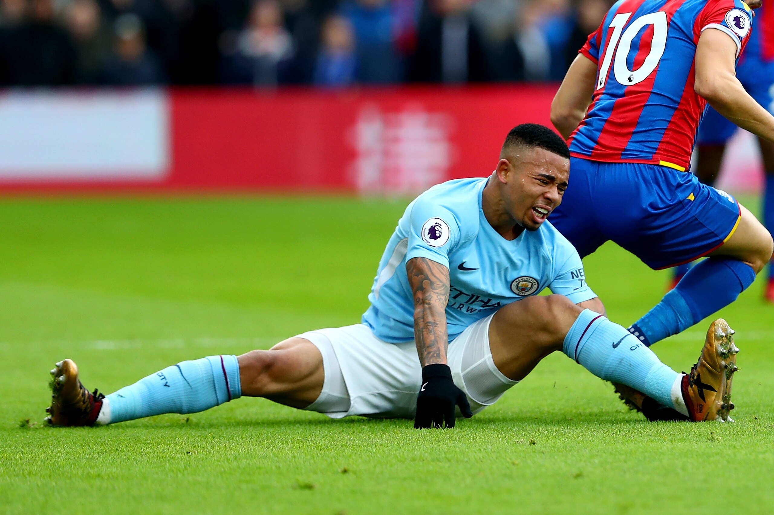 LONDON, ENGLAND - DECEMBER 31:  Gabriel Jesus of Manchester City reacts after injuring himself during the Premier League match between Crystal Palace and Manchester City at Selhurst Park on December 31, 2017 in London, England.  (Photo by Clive Rose/Getty