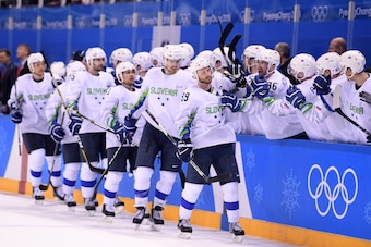 GANGNEUNG, SOUTH KOREA - FEBRUARY 14:  Jan Mursak #39 of Slovenia celebrates after scoring the tying goal against Ryan Zapolski #30 of the United States in the third period during the Men's Ice Hockey Preliminary Round Group B game on day five of the Pyeo