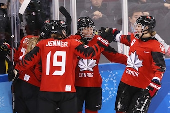 GANGNEUNG, SOUTH KOREA - FEBRUARY 15:  Jocelyne Larocque #3 of Canada and Jennifer Wakefield #9 of Canada celebrate after a goal by Meghan Agosta #2 of Canada in the second period against the United States during the Women's Ice Hockey Preliminary Round G