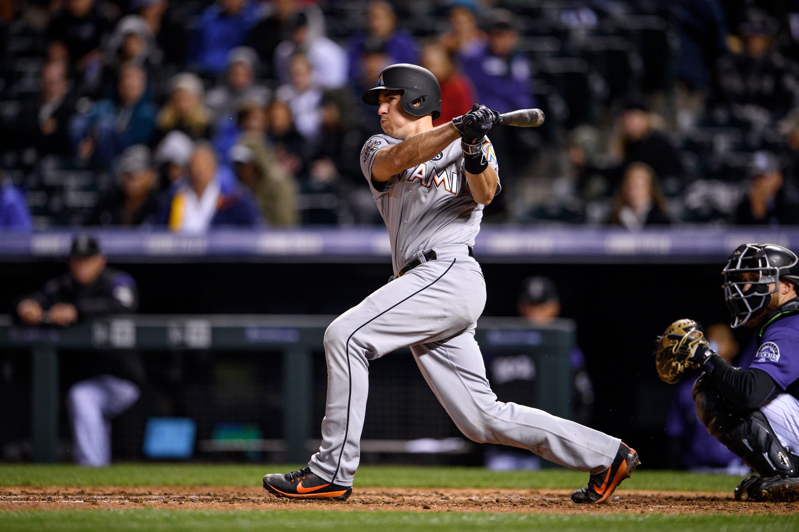 DENVER, CO - SEPTEMBER 25: J.T. Realmuto #11 of the Miami Marlins at bat during the game against the Colorado Rockies at Coors Field on September 25, 2017 in Denver, Colorado. (Photo by Rob Foldy/Miami Marlins via Getty Images)