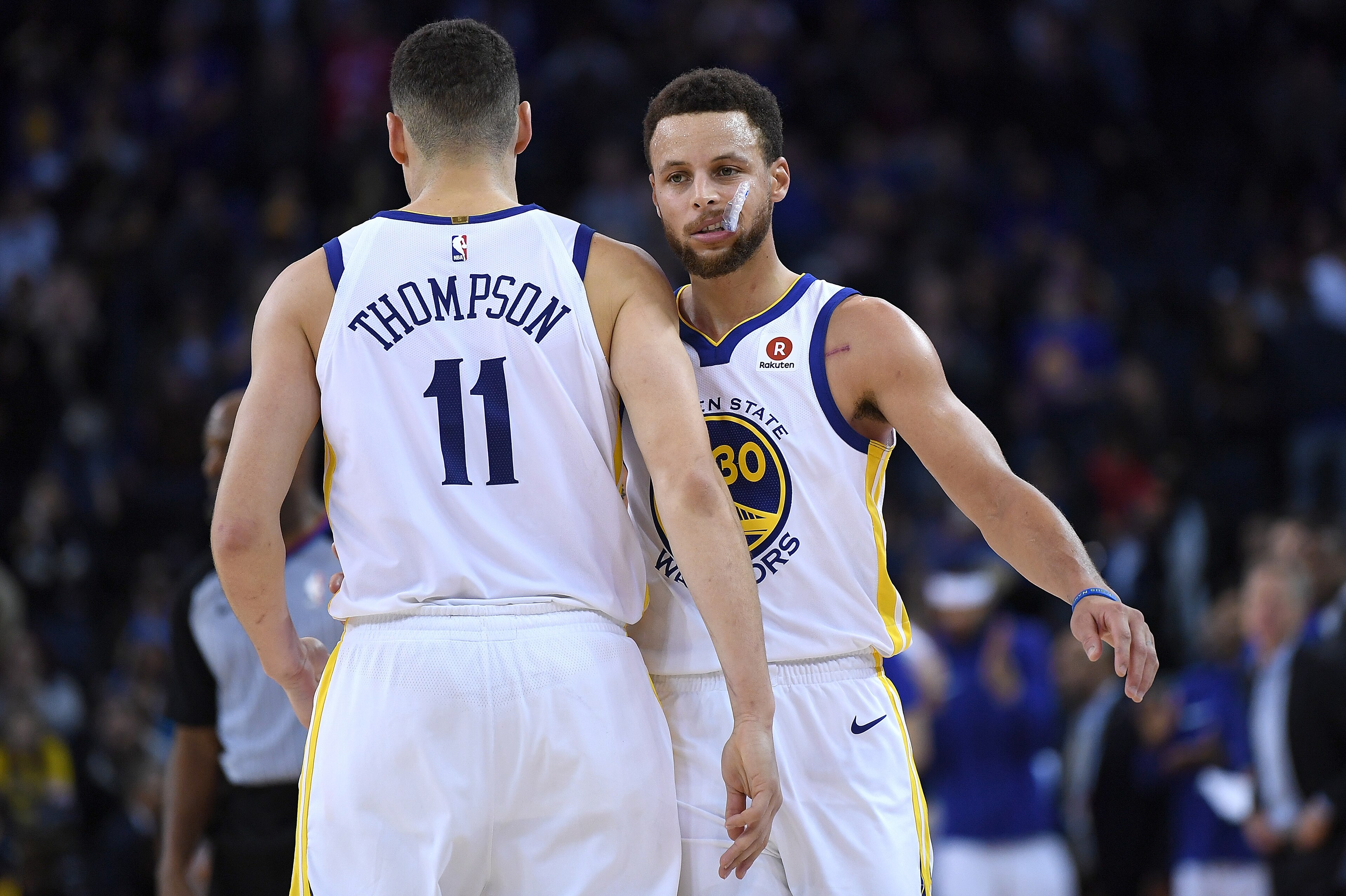 OAKLAND, CA - JANUARY 08: Klay Thompson #11 and Stephen Curry #30 of the Golden State Warriors celebrates after they defeated the Denver Nuggets 124-114 during an NBA Basketballl game at ORACLE Arena on January 8, 2018 in Oakland, California. NOTE TO USE OAKLAND, CA - JANUARY 08: Klay Thompson #11 and Stephen Curry #30 of the Golden State Warriors celebrates after they defeated the Denver Nuggets 124-114 during an NBA Basketballl game at ORACLE Arena on January 8, 2018 in Oakland, California. NOTE TO USE