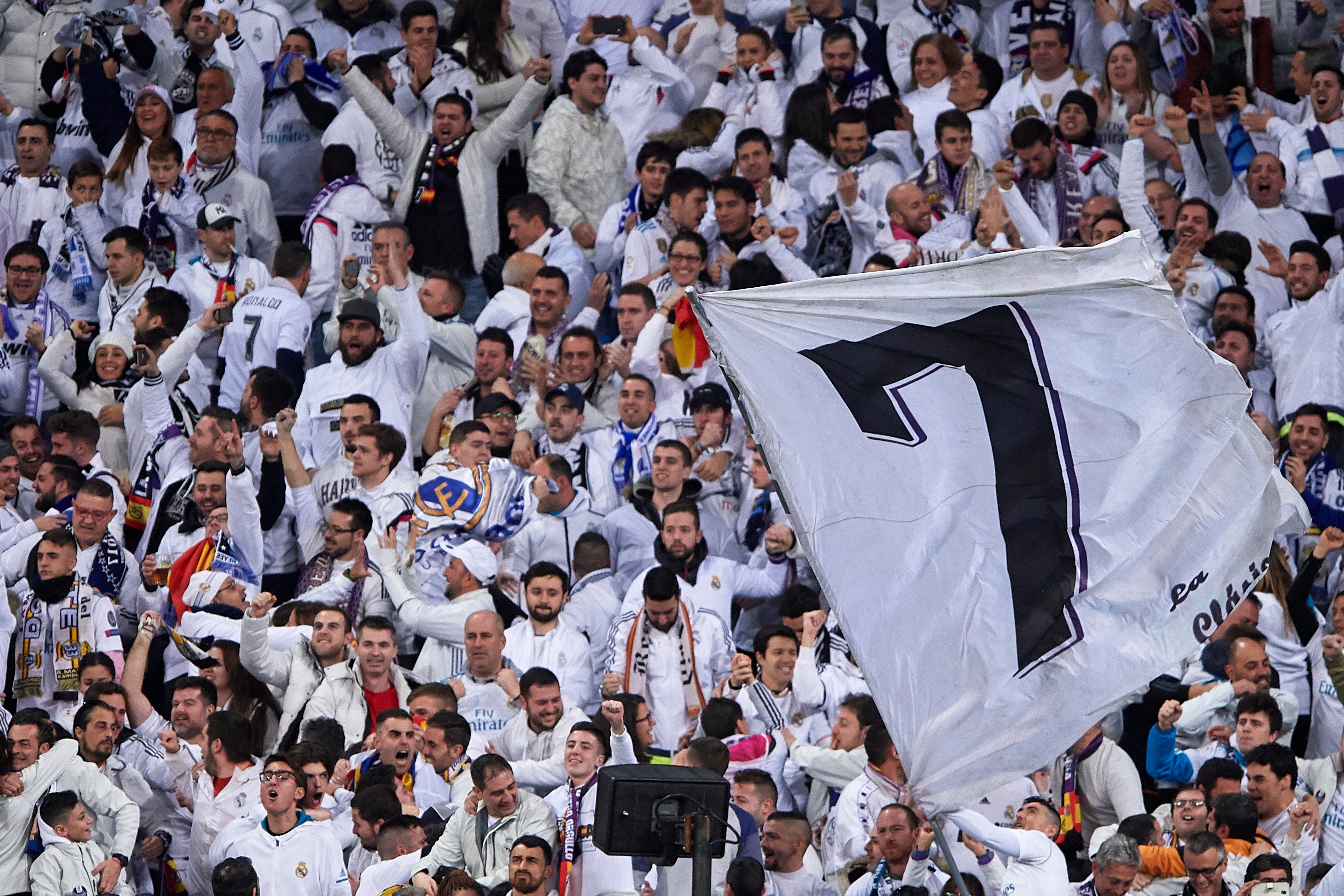 MADRID, SPAIN - FEBRUARY 14:   Real Madrid fans cheers during the UEFA Champions League Round of 16 First Leg match between Real Madrid and Paris Saint-Germain at Bernabeu on February 14, 2018 in Madrid, Spain.  (Photo by Manuel Queimadelos Alonso/Getty I