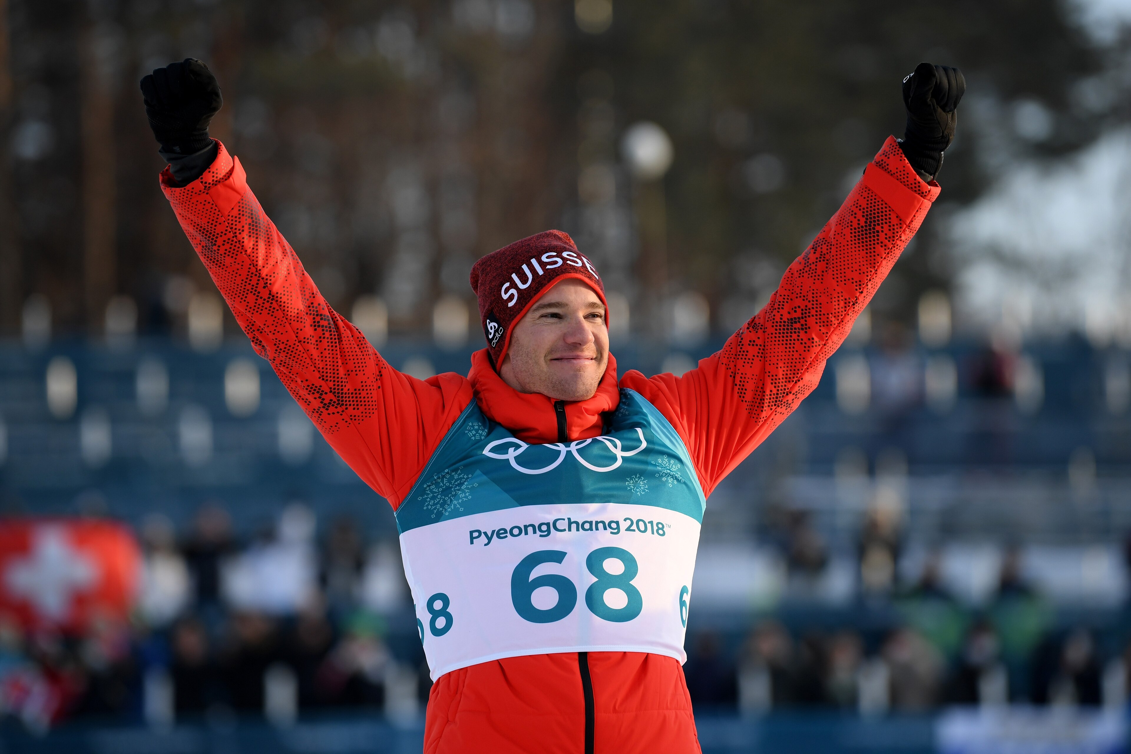 PYEONGCHANG-GUN, SOUTH KOREA - FEBRUARY 16:  Gold medal winner Dario Cologna of Switzerland celebrates during the victory ceremony after the Cross-Country Skiing Men's 15km Free at Alpensia Cross-Country Centre on February 16, 2018 in Pyeongchang-gun, Sou