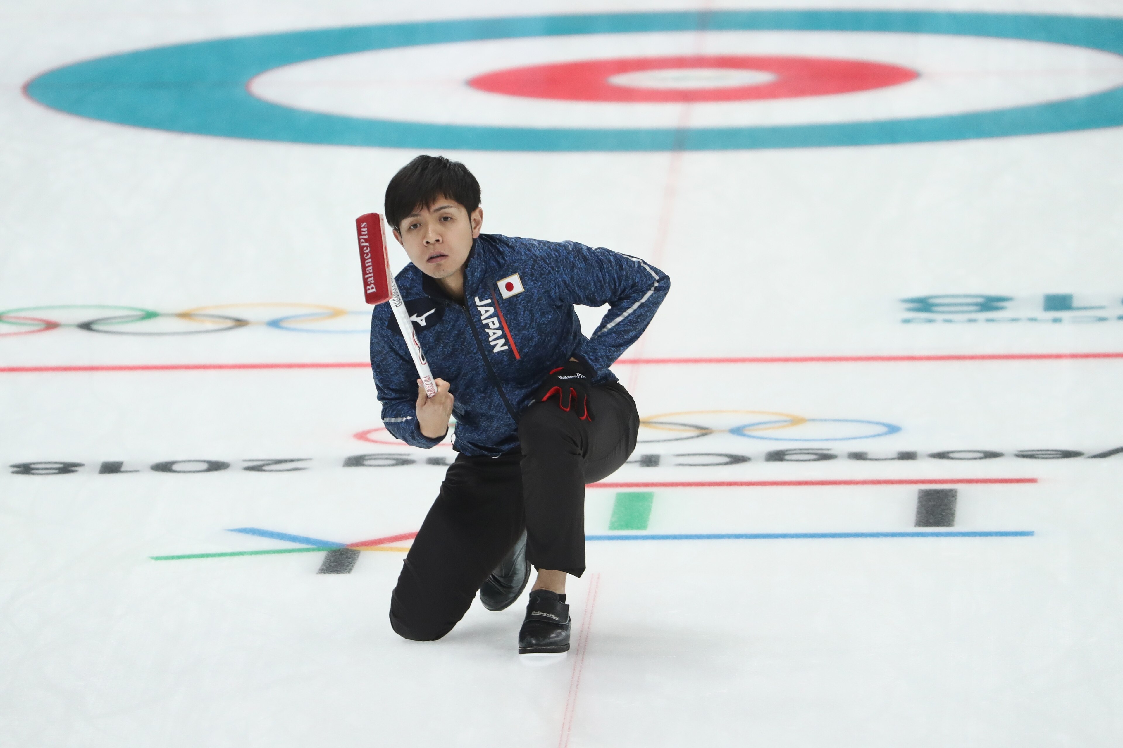 GANGNEUNG, SOUTH KOREA - FEBRUARY 16: Yusuke Morozumi of Japan competes in the Curling Men's Round Robin Session 5 held at Gangneung Curling Centre on February 16, 2018 in Gangneung, South Korea.  (Photo by Robert Cianflone/Getty Images)
