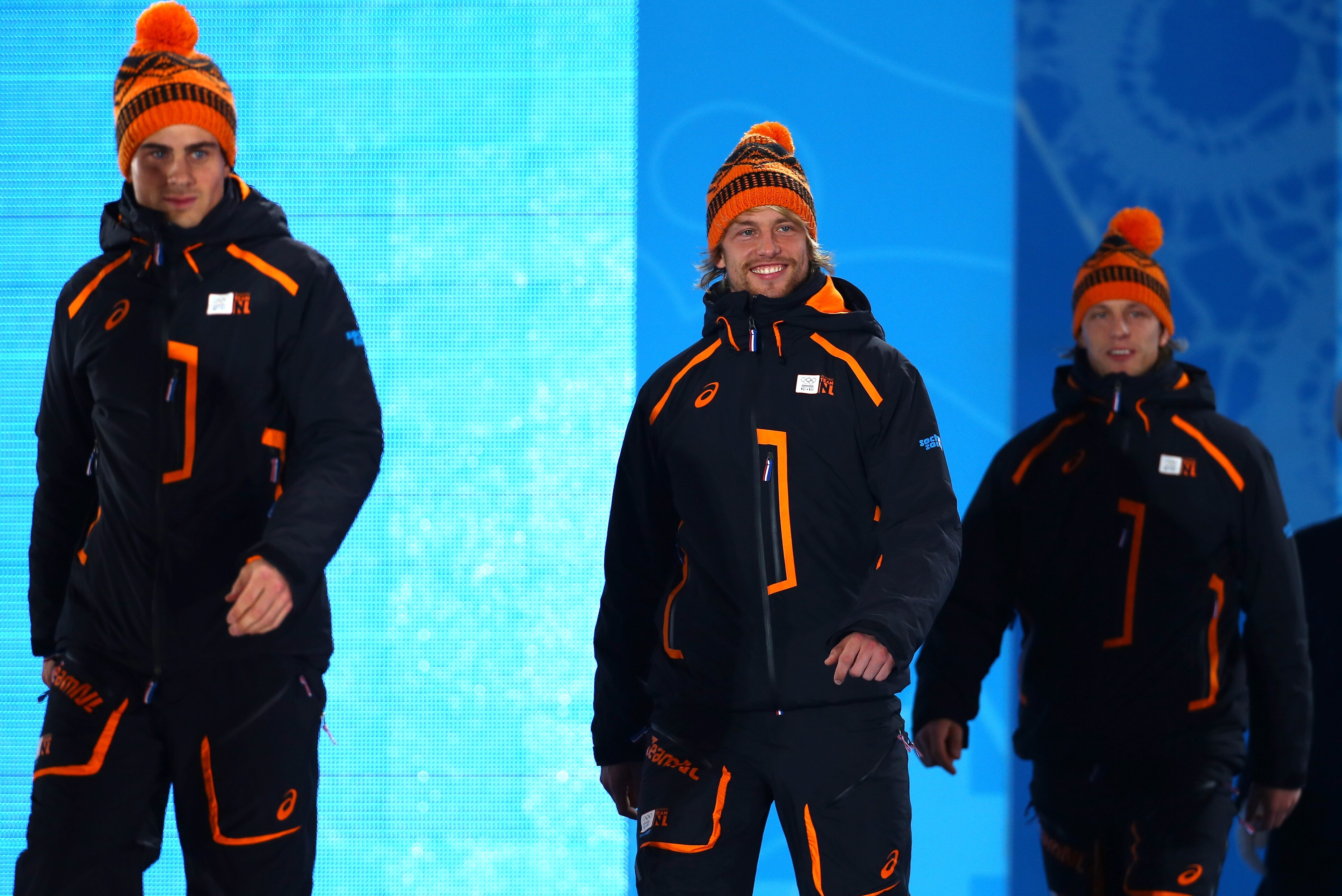 SOCHI, RUSSIA - FEBRUARY 11:  (L-R) Silver medalist Jan Smeekens of the Netherlands, gold medalist Michel Mulder of the Netherlands and bronze medalist Ronald Mulder of the Netherlands celebrate on the podium during the medal ceremony for the for the Men'