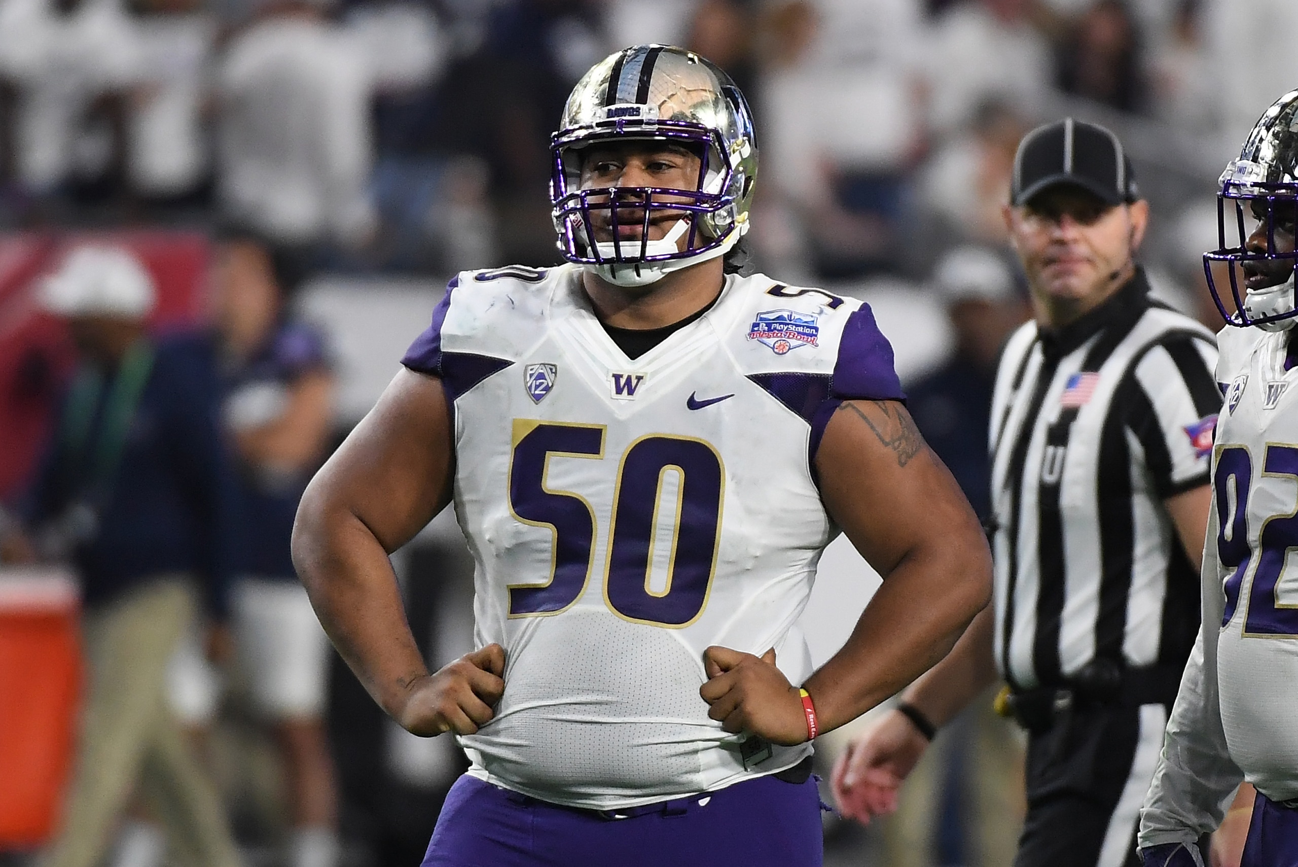 GLENDALE, AZ - DECEMBER 30:  Vita Vea #50 of the Washington Huskies looks across the line of scrimmage prior to a play against the Penn State Nittany Lions during the Playstation Fiesta Bowl at University of Phoenix Stadium on December 30, 2017 in Glendal