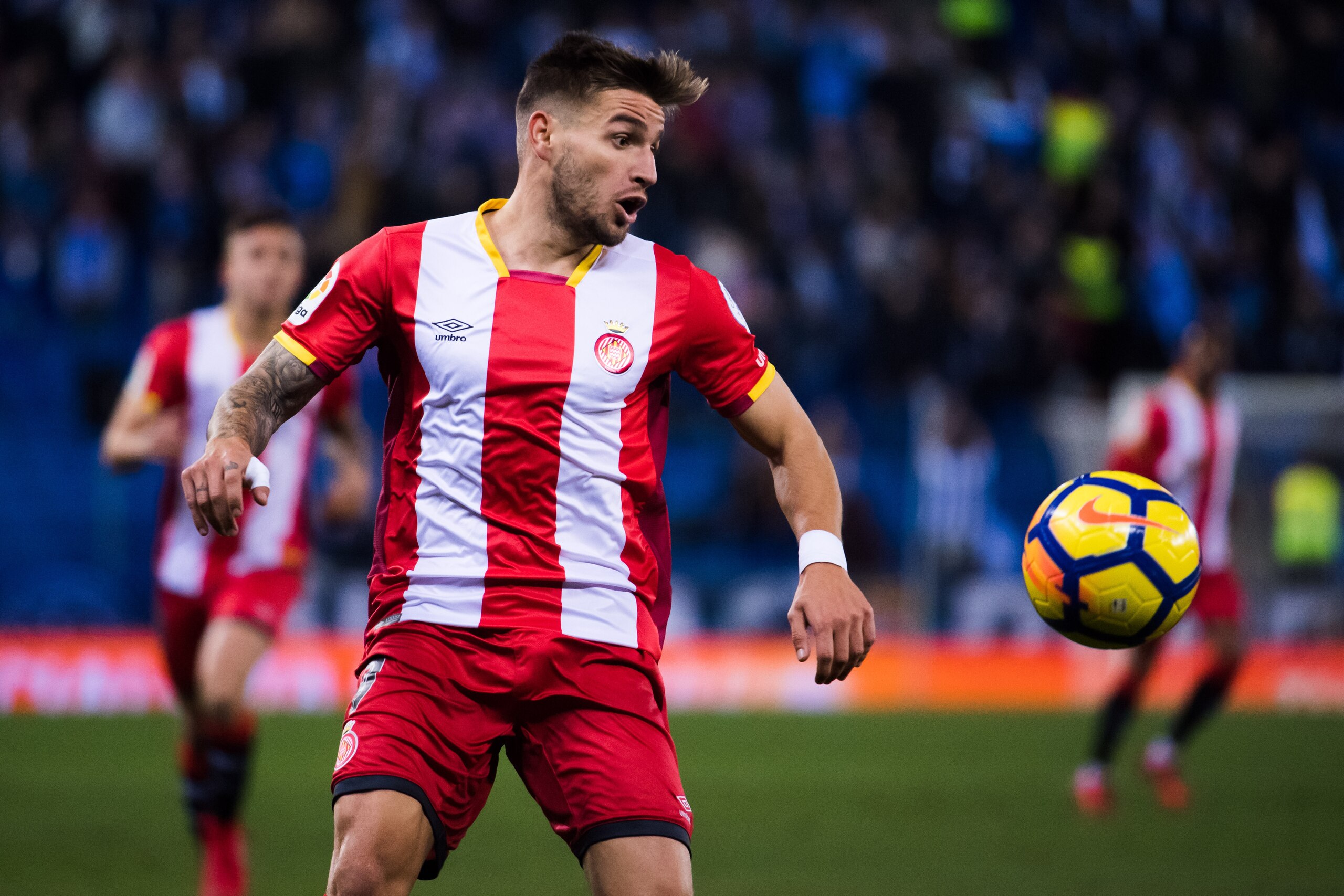 BARCELONA, SPAIN - DECEMBER 11:  Cristian 'Portu' of Girona FC runs for the ball during the La Liga match between RCD Espanyol and Girona FC at RCDE Stadium on December 11, 2017 in Barcelona, Spain.  (Photo by Alex Caparros/Getty Images)