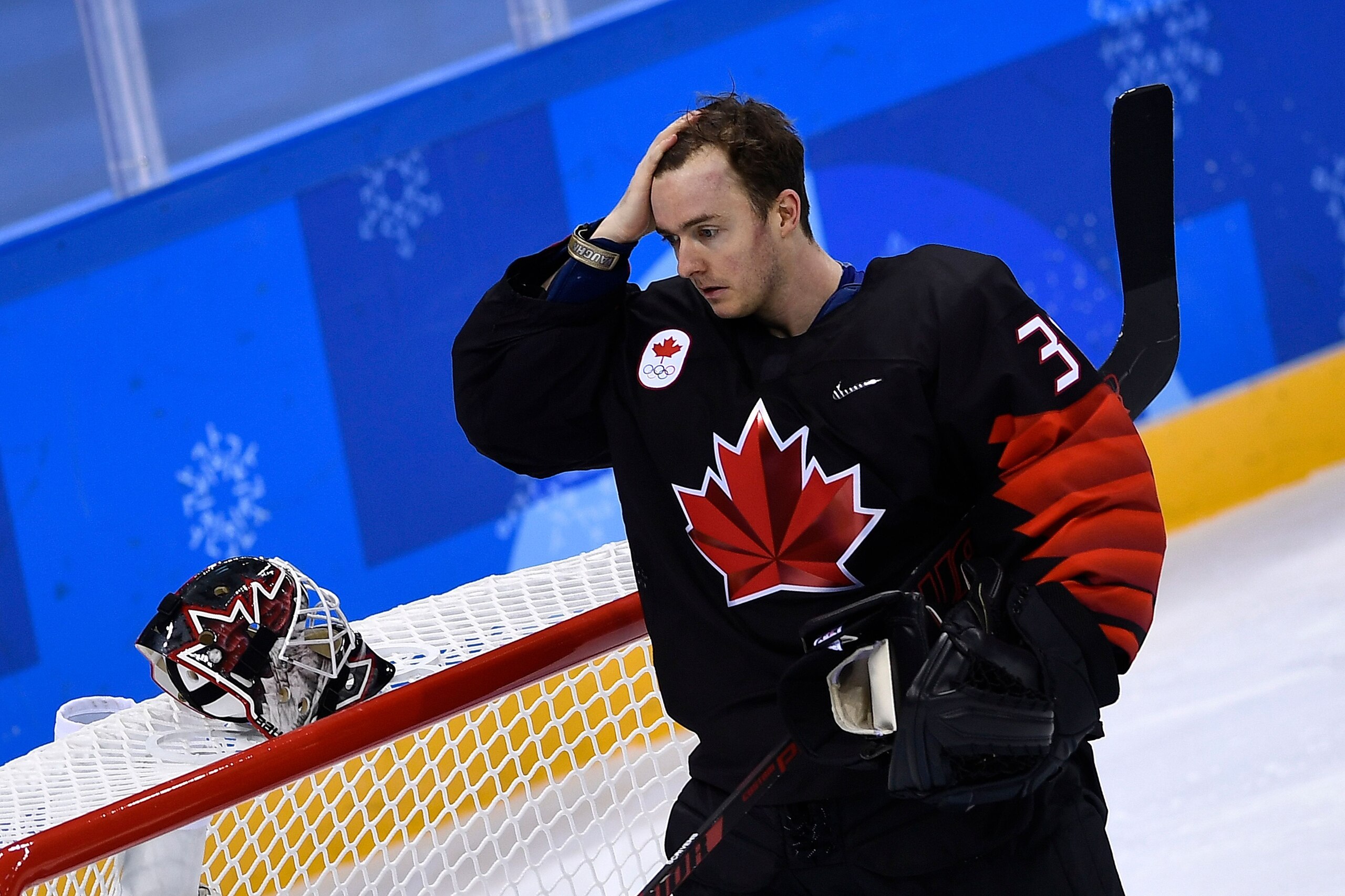 Canada's Ben Scrivens leaves the rink during the final period of the men's preliminary round ice hockey match between Canada and Czech Republic during the Pyeongchang 2018 Winter Olympic Games at the Gangneung Hockey Centre in Gangneung on February 17, 20