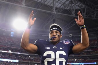 GLENDALE, AZ - DECEMBER 30:  Running back Saquon Barkley #26 of the Penn State Nittany Lions reacts on the bench during the final moments of the second half of the Playstation Fiesta Bowl against the Washington Huskies at University of Phoenix Stadium on 