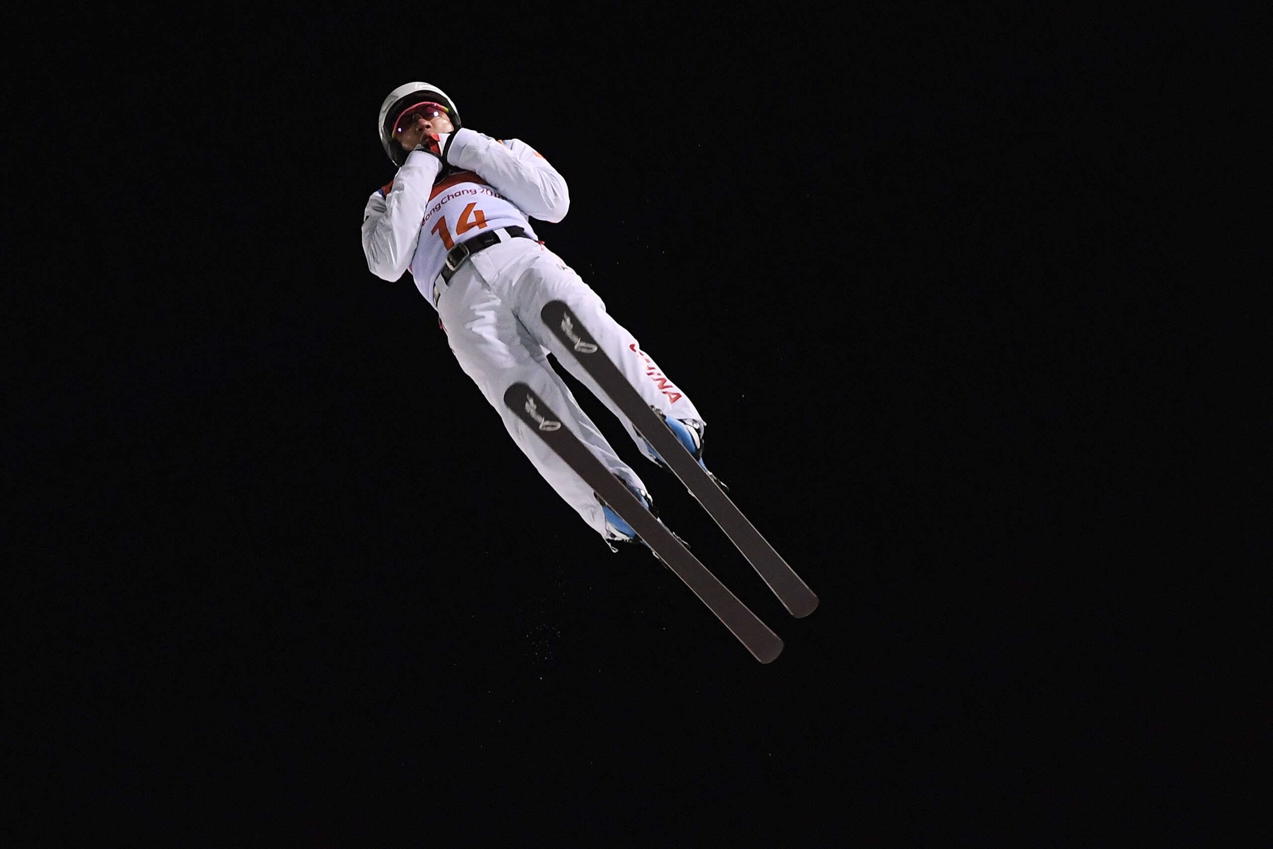 China's Jia Zongyang competes in the men's aerials qualification event during the Pyeongchang 2018 Winter Olympic Games at the Phoenix Park in Pyeongchang on February 17, 2018. / AFP PHOTO / LOIC VENANCE        (Photo credit should read LOIC VENANCE/AFP/G