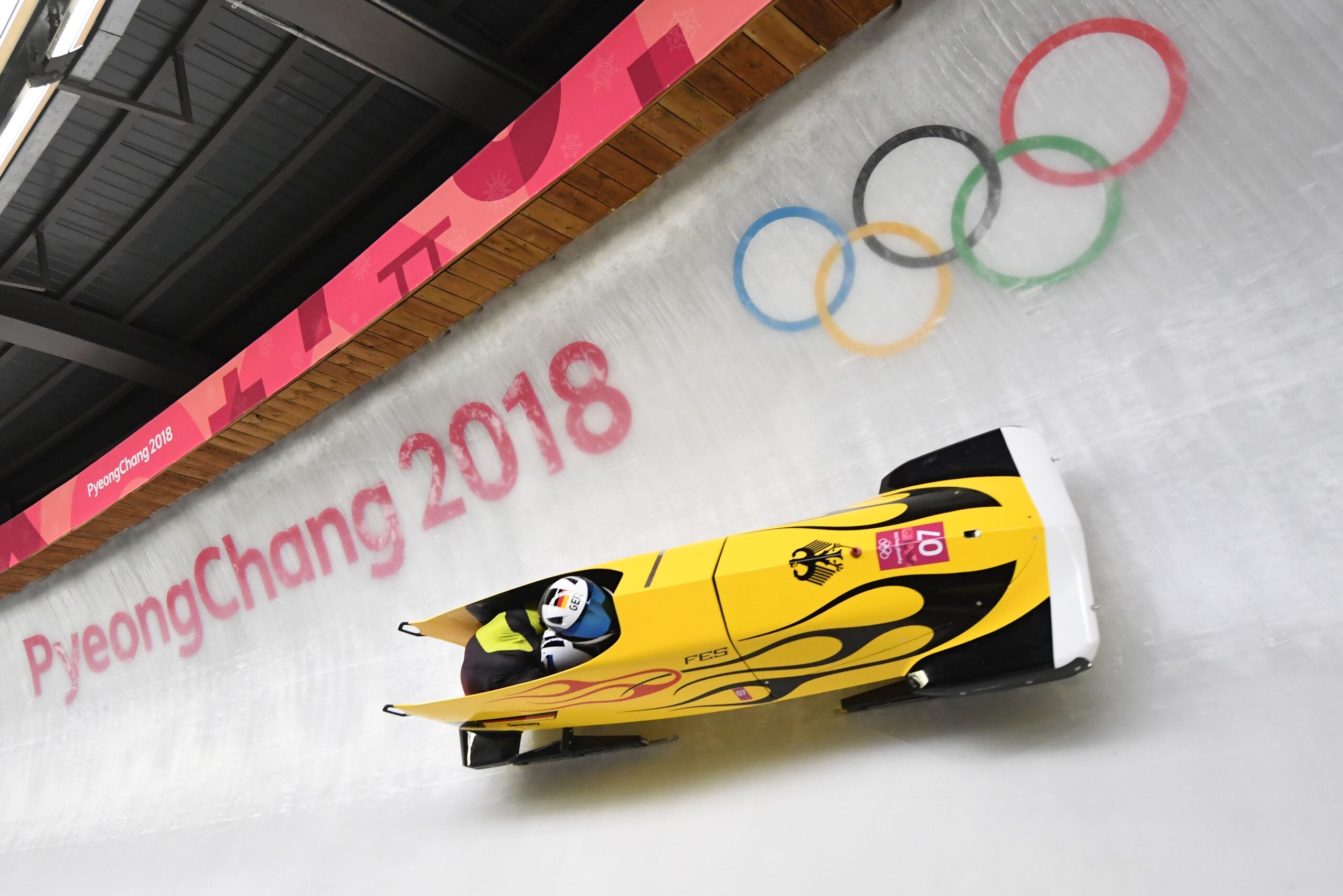 Germany's Francesco Friedrich and Germany's Thorsten Margis compete in the 2-man bobsleigh heat 1 run during the Pyeongchang 2018 Winter Olympic Games, at the Olympic Sliding Centre on February 18, 2018 in Pyeongchang. / AFP PHOTO / Mark Ralston ( Germany's Francesco Friedrich and Germany's Thorsten Margis compete in the 2-man bobsleigh heat 1 run during the Pyeongchang 2018 Winter Olympic Games, at the Olympic Sliding Centre on February 18, 2018 in Pyeongchang. / AFP PHOTO / Mark Ralston (