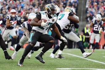 FOXBOROUGH, MA - JANUARY 21:  Leonard Fournette #27 of the Jacksonville Jaguars carries the ball in the second quarter during the AFC Championship Game against the New England Patriots at Gillette Stadium on January 21, 2018 in Foxborough, Massachusetts. 
