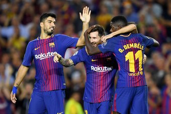BARCELONA, SPAIN - SEPTEMBER 12:  Lionel Messi of Barcelona celebrates scoring his sides third goal with Ousmane Dembele of Barcelona and Luis Suarez of Barcelona during the UEFA Champions League Group D match between FC Barcelona and Juventus at Camp Nou