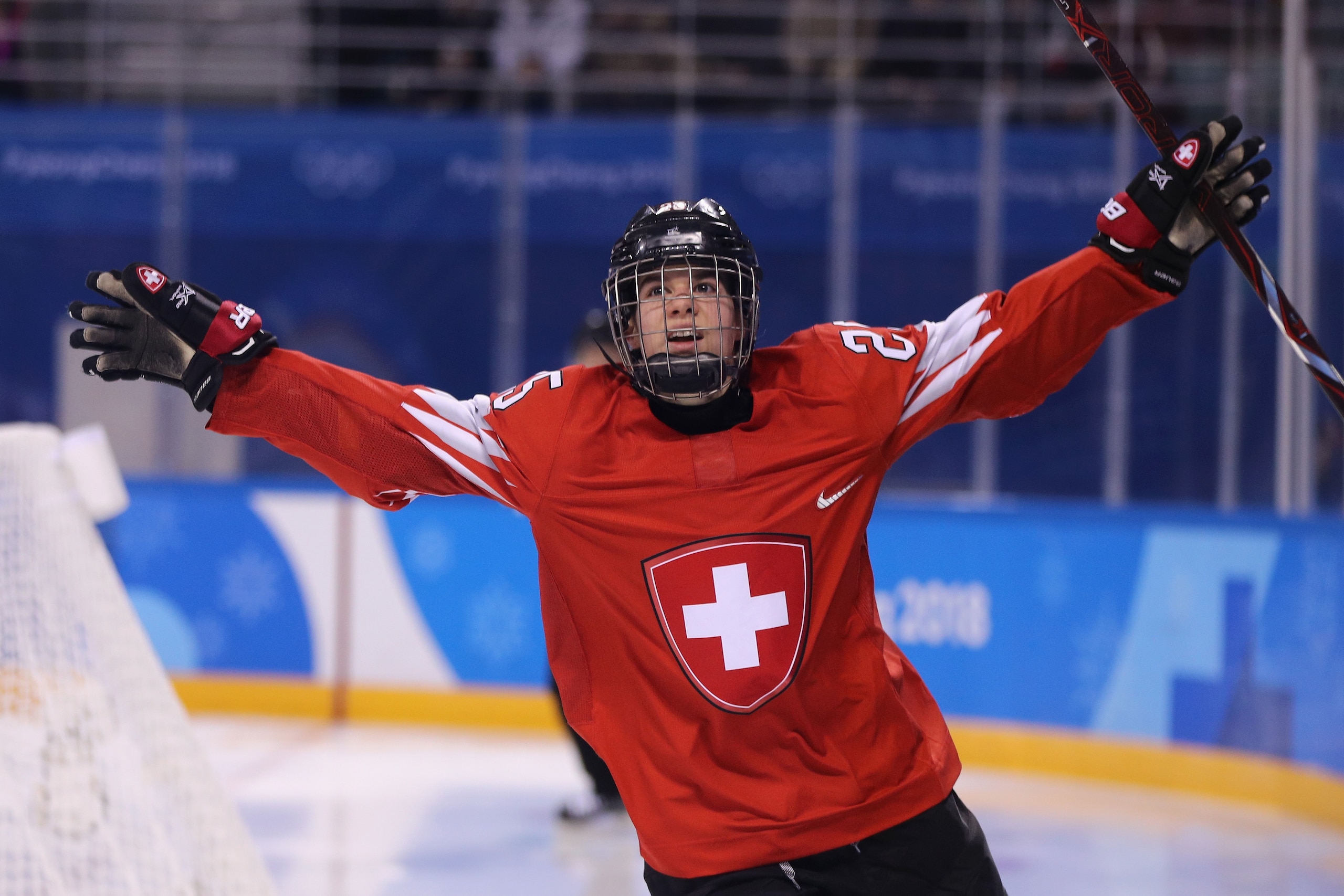 GANGNEUNG, SOUTH KOREA - FEBRUARY 17:  Alina Muller #25 of Switzerland celebrates after scoring a goal in the second period against Olympic Athlete from Russia during the Ice Hockey Women's Play-offs Quarterfinals on day eight of the PyeongChang 2018 Wint