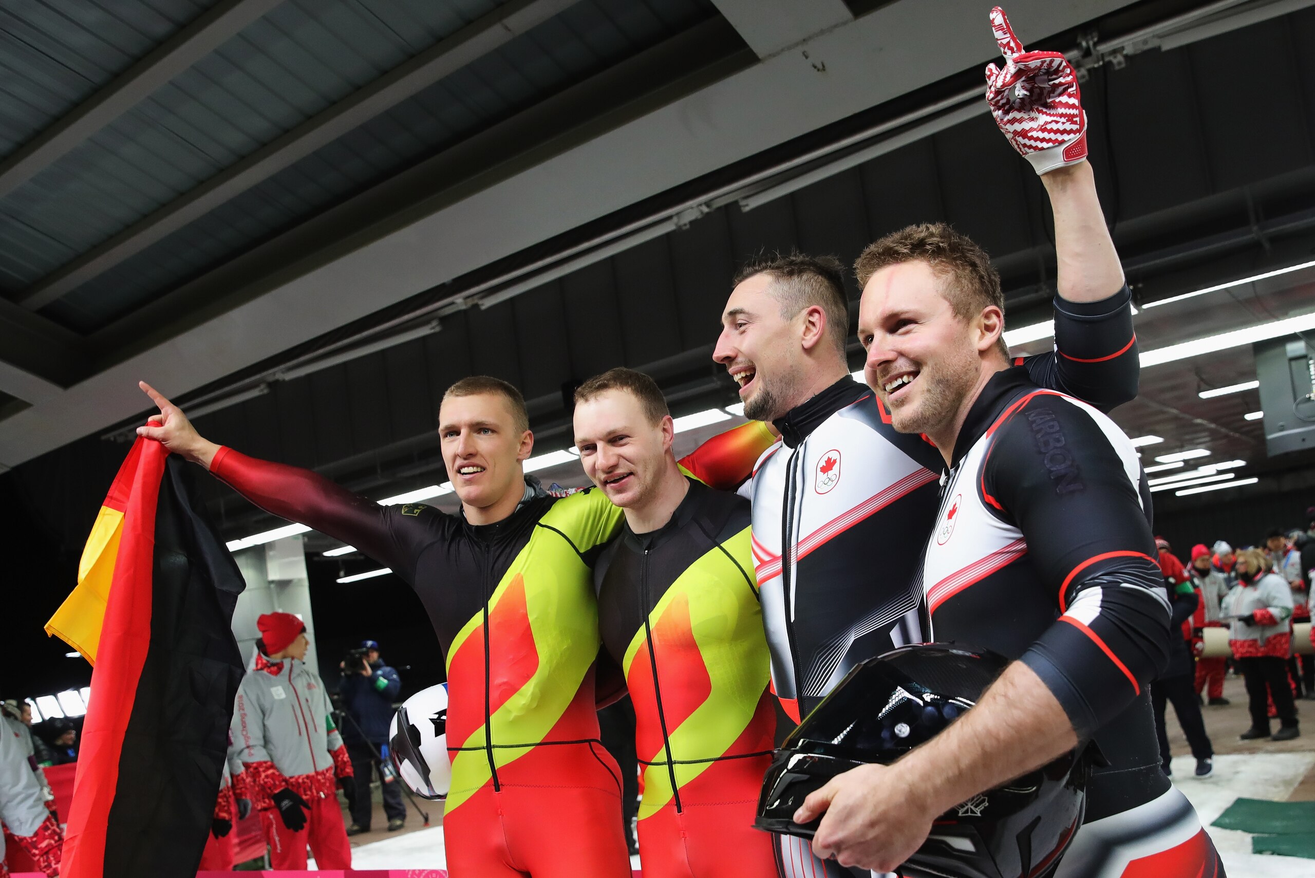 PYEONGCHANG-GUN, SOUTH KOREA - FEBRUARY 19: Joint gold medalists Thorsten Margis and Francesco Friedrich of Germany and Alexander Kopacz and Justin Kripps of Canada celebrate after the Men's 2-Man Bobsleigh on day 10 of the PyeongChang 2018 Winter Olympi PYEONGCHANG-GUN, SOUTH KOREA - FEBRUARY 19: Joint gold medalists Thorsten Margis and Francesco Friedrich of Germany and Alexander Kopacz and Justin Kripps of Canada celebrate after the Men's 2-Man Bobsleigh on day 10 of the PyeongChang 2018 Winter Olympi