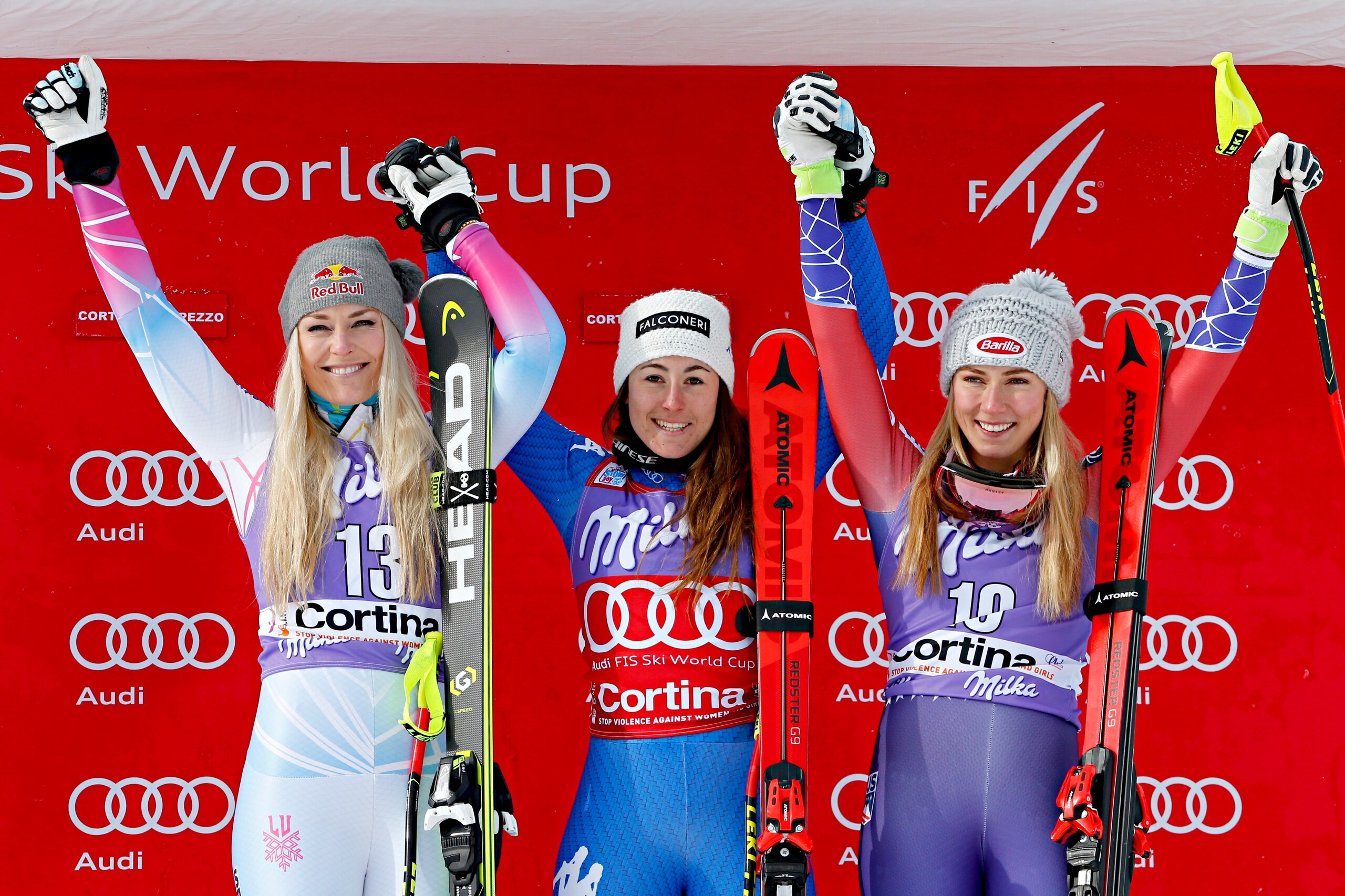 CORTINA D'AMPEZZO, ITALY - JANUARY 19: Lindsey Vonn of USA takes 2nd place, Sofia Goggia of Italy takes 1st place, Mikaela Shiffrin of USA takes 3rd place during the Audi FIS Alpine Ski World Cup Women's Downhill on January 19, 2018 in Cortina d'Ampezzo, 