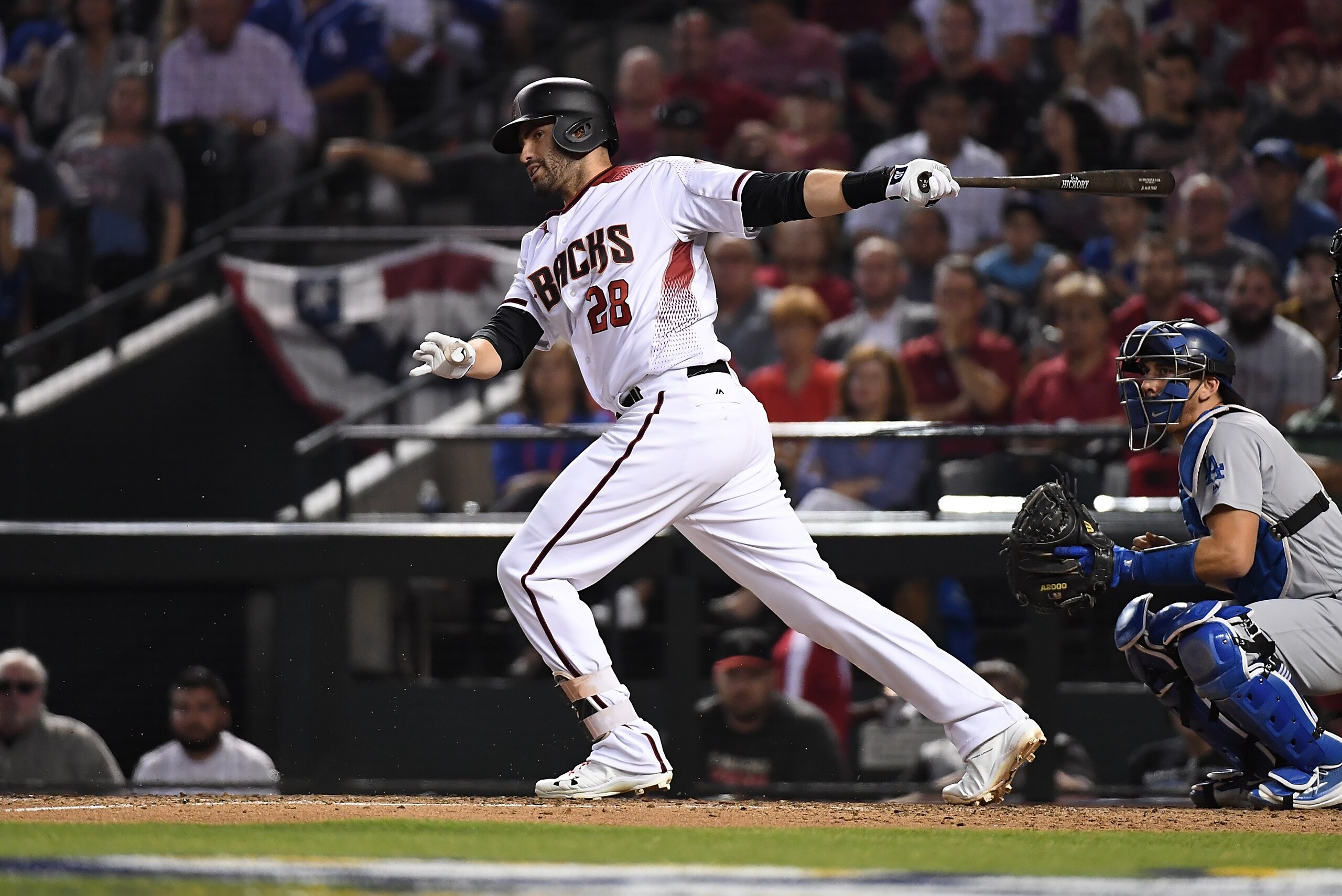 PHOENIX, AZ - OCTOBER 09: JD Martinez #28 of the Arizona Diamondbacks follows through on a swing during game three of the National League Divisional Series against the Los Angeles Dodgers at Chase Field on October 9, 2017 in Phoenix, Arizona. (Photo by PHOENIX, AZ - OCTOBER 09: JD Martinez #28 of the Arizona Diamondbacks follows through on a swing during game three of the National League Divisional Series against the Los Angeles Dodgers at Chase Field on October 9, 2017 in Phoenix, Arizona. (Photo by