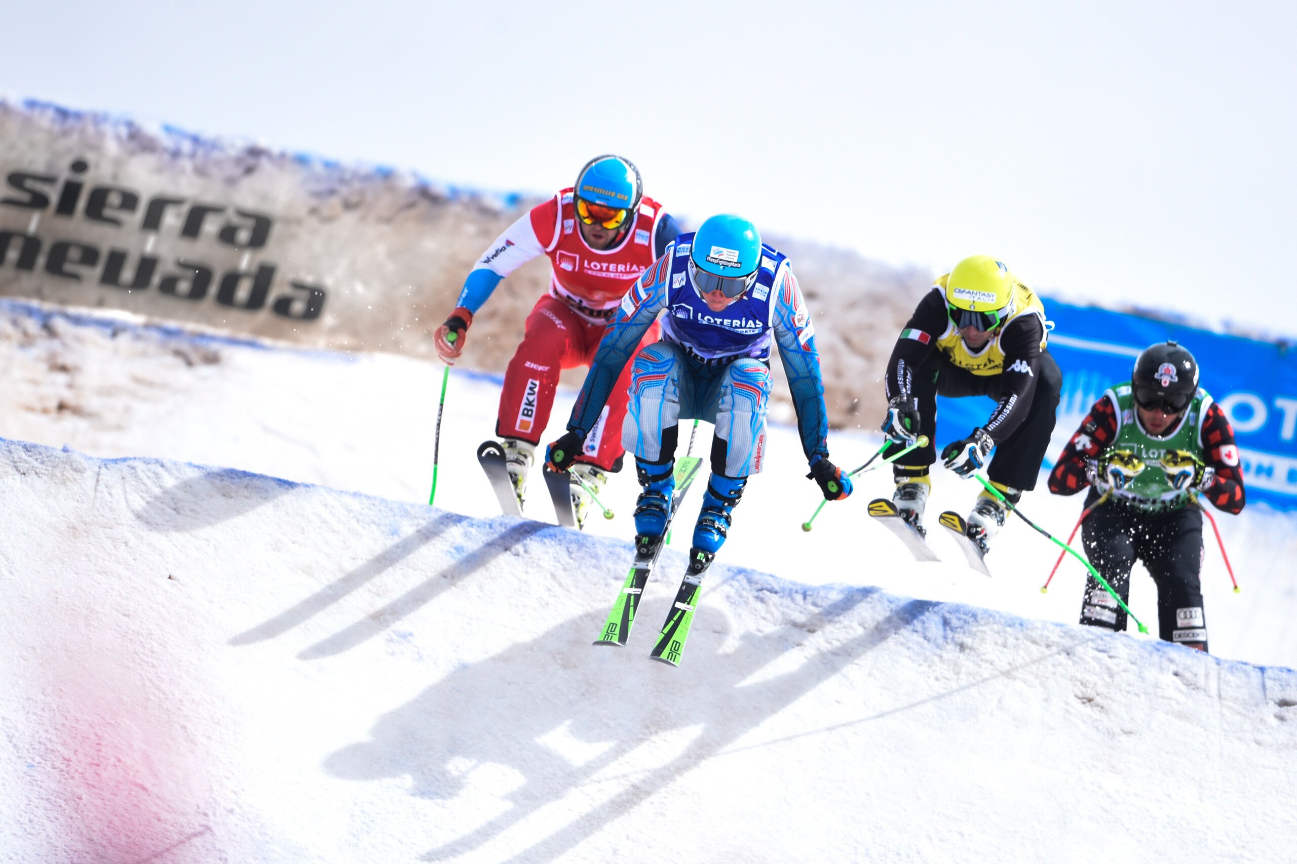 SIERRA NEVADA, SPAIN - MARCH 18: Stefan Thanei of Italy competes, David Duncan of Canada competes, Semen Denshchikov of Russia competes, Marc Bischofberger of Switzerland competes during the FIS Freestyle Ski & Snowboard World Championships Ski Cross on M SIERRA NEVADA, SPAIN - MARCH 18: Stefan Thanei of Italy competes, David Duncan of Canada competes, Semen Denshchikov of Russia competes, Marc Bischofberger of Switzerland competes during the FIS Freestyle Ski & Snowboard World Championships Ski Cross on M