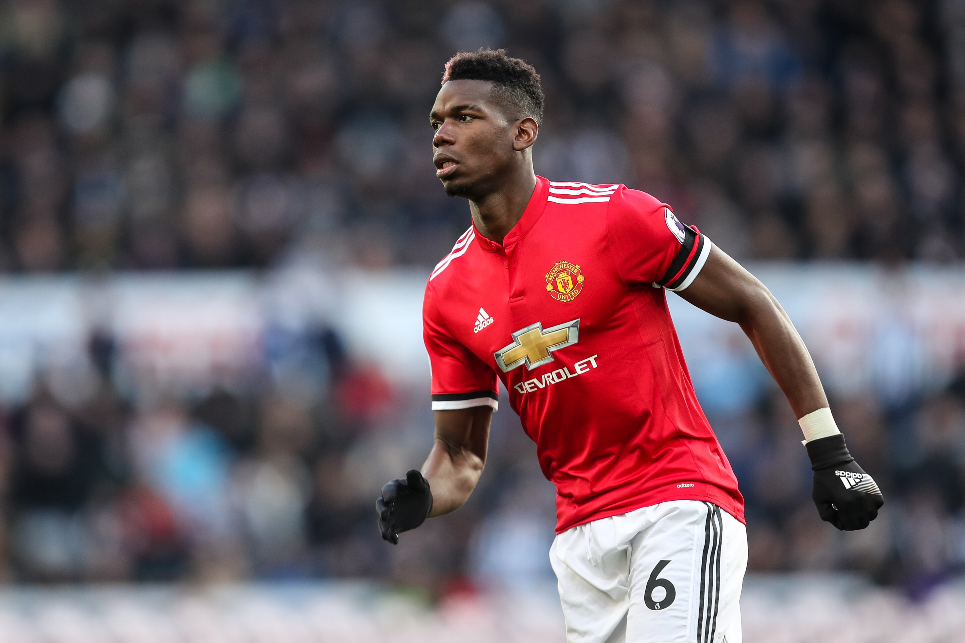 NEWCASTLE UPON TYNE, ENGLAND - FEBRUARY 11: Paul Pogba of Manchester United during the Premier League match between Newcastle United and Manchester United at St. James Park on February 11, 2018 in Newcastle upon Tyne, England. (Photo by Robbie Jay Barratt