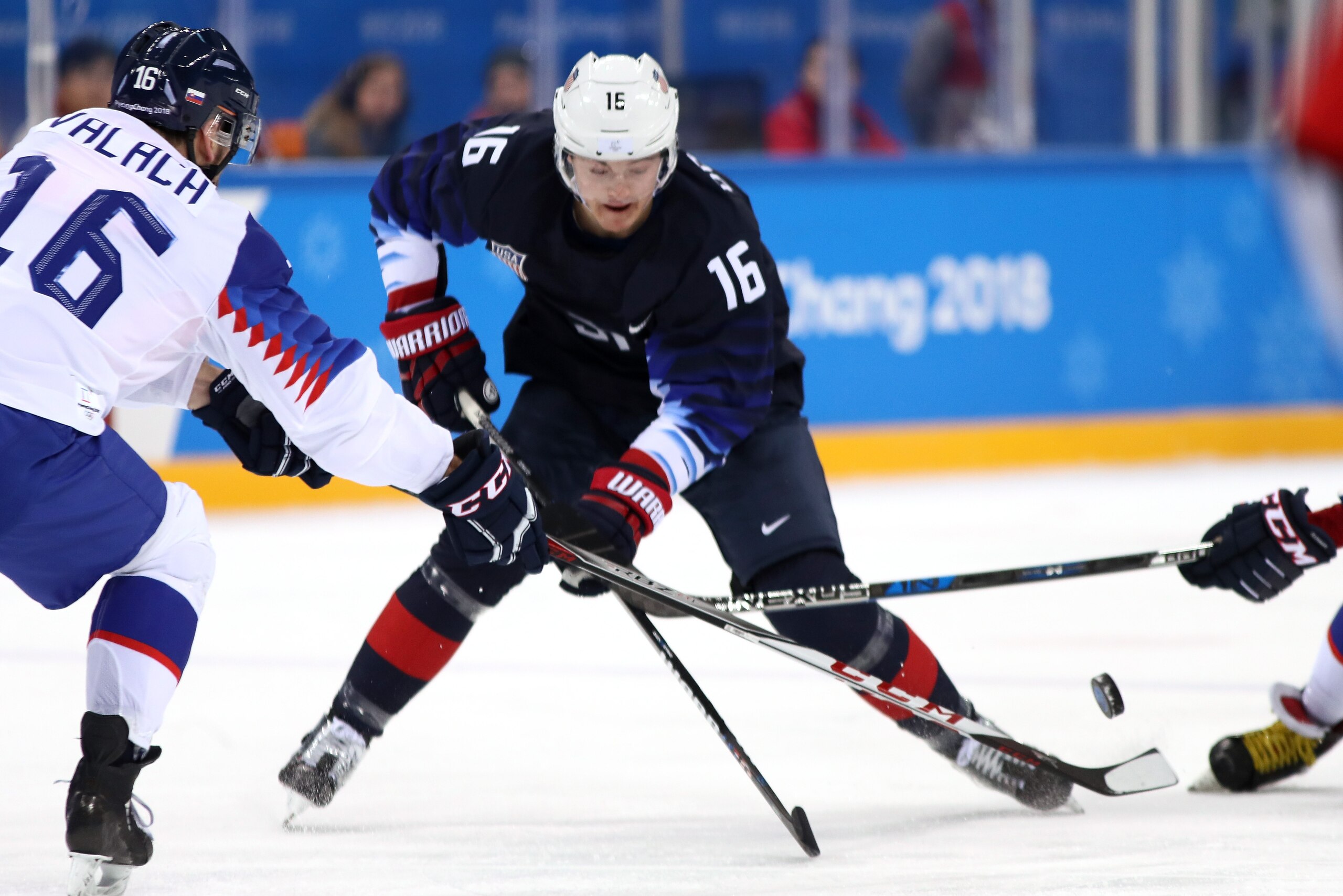 GANGNEUNG, SOUTH KOREA - FEBRUARY 16: Ryan Donato #16 of the United States handles the puck against Juraj Valach #16 of Slovakia during the Men's Ice Hockey Preliminary Round Group B game at Gangneung Hockey Centre on February 16, 2018 in Gangneung, South
