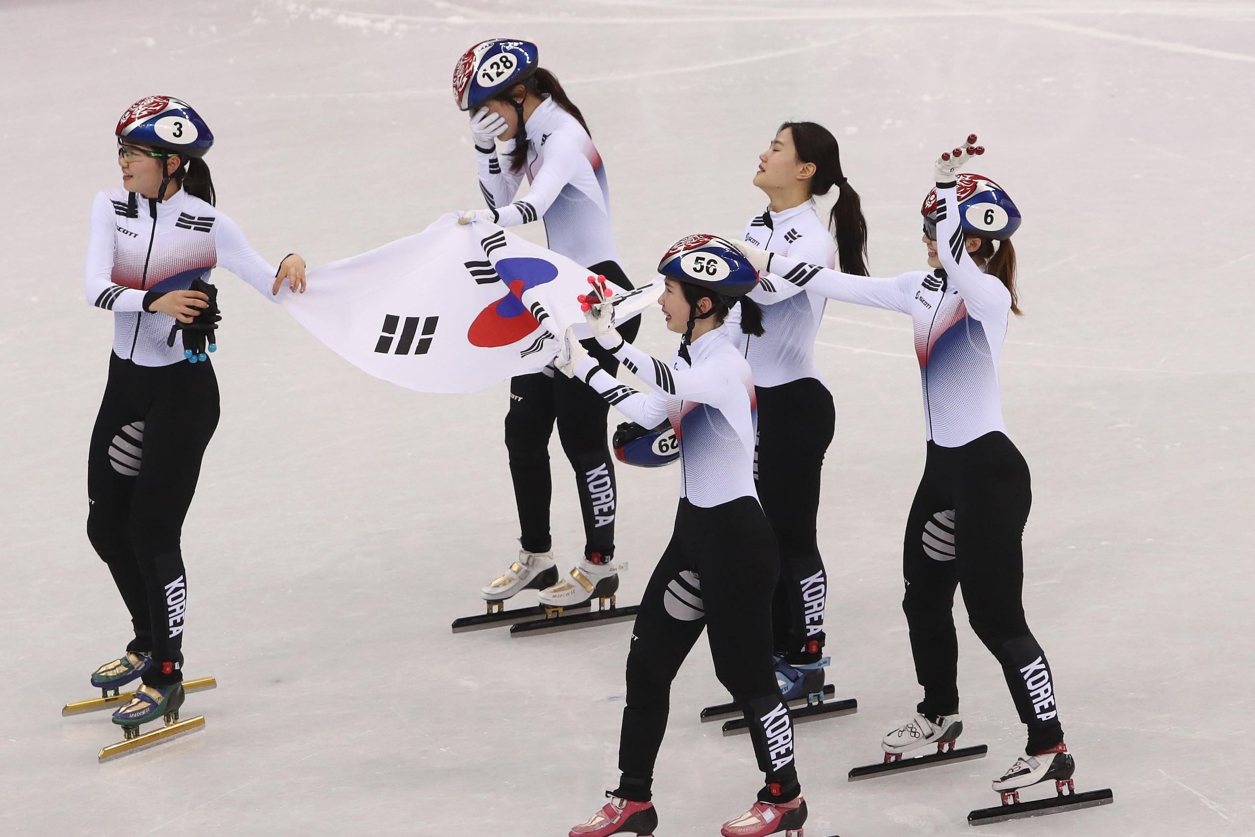 GANGNEUNG, SOUTH KOREA - FEBRUARY 20:  The Korea team celebrate winning the gold medal following the Ladies Short Track Speed Skating 3000m Relay Final A on day eleven of the PyeongChang 2018 Winter Olympic Games at Gangneung Ice Arena on February 20, 201