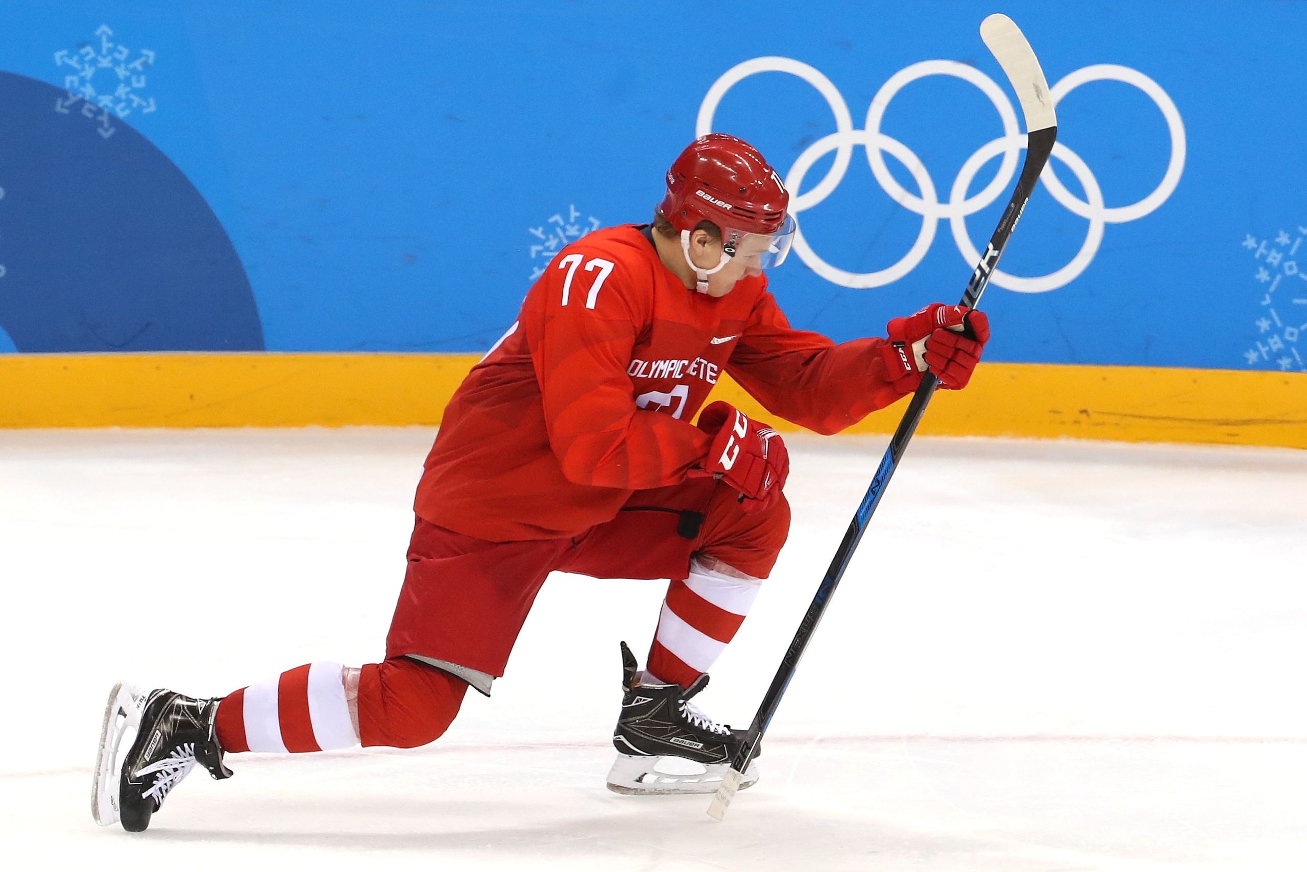 GANGNEUNG, SOUTH KOREA - FEBRUARY 16:  Kirill Kaprizov #77 of Olympic Athlete from Russia celebrates after scoring a hat trick against Slovenia in the third period during the Men's Ice Hockey Preliminary Round Group B game at Gangneung Hockey Centre on Fe