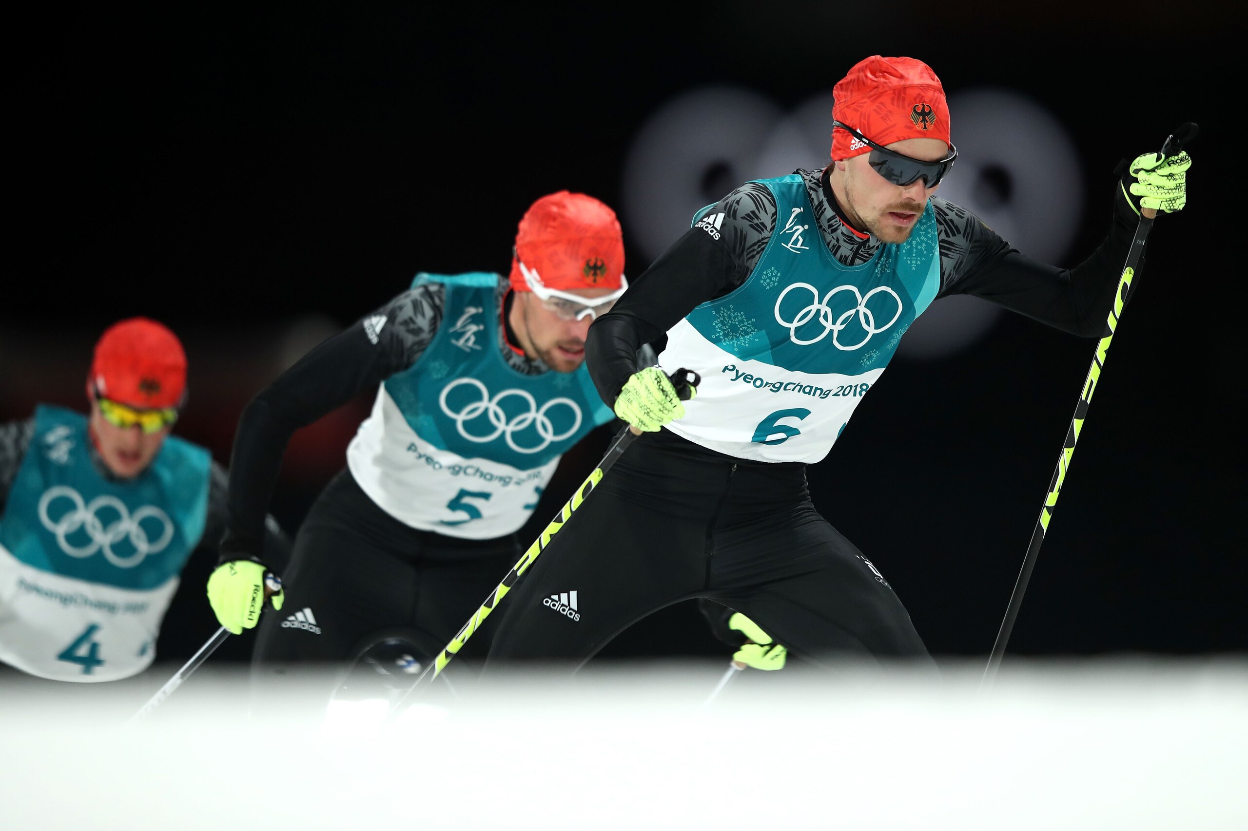 PYEONGCHANG-GUN, SOUTH KOREA - FEBRUARY 20:  Fabian Riessle (R) of Germany, Johannes Rydzek (C) of Germany and Eric Frenzel (L) of Germany compete during the Nordic Combined Individual Gundersen 10km Cross-Country on day eleven of the PyeongChang 2018 Win