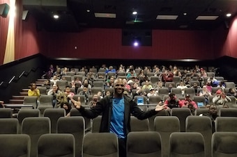 Mike Adams brought 100 people from Paterson. N.J. to a screening of "Black Panther" over Presidents Day weekend.