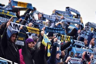 CHESTER, PA - MARCH 20: Philadelphia Union fans hold up their scarves during the game against the New England Revolution at Talen Energy Stadium on March 20, 2016 in Chester, Pennsylvania. (Photo by Drew Hallowell/Getty Images)